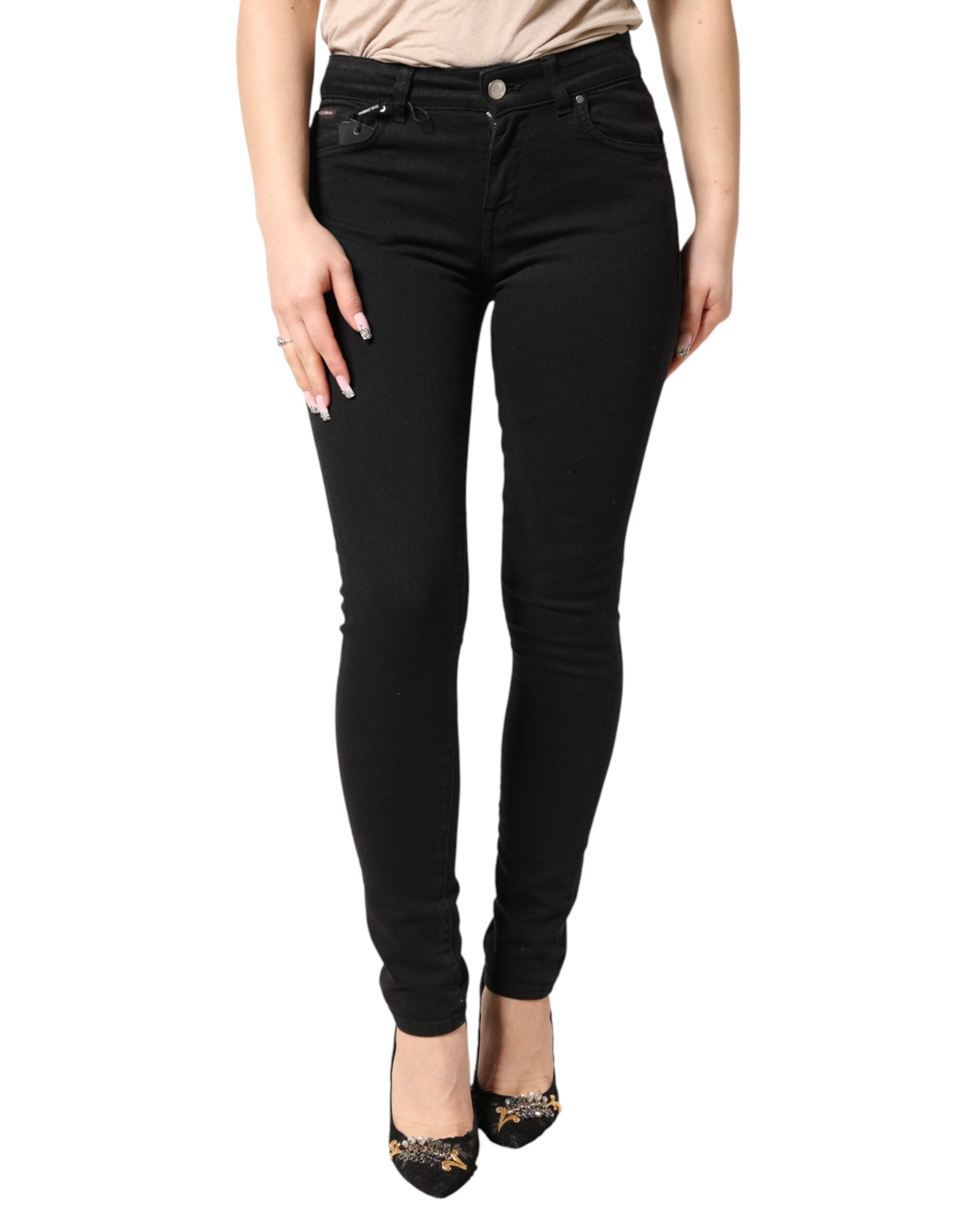 Jeans slim en coton stretch noir de Dolce & Gabbana, coupe skinny, avec détails en denim et fermeture éclair.