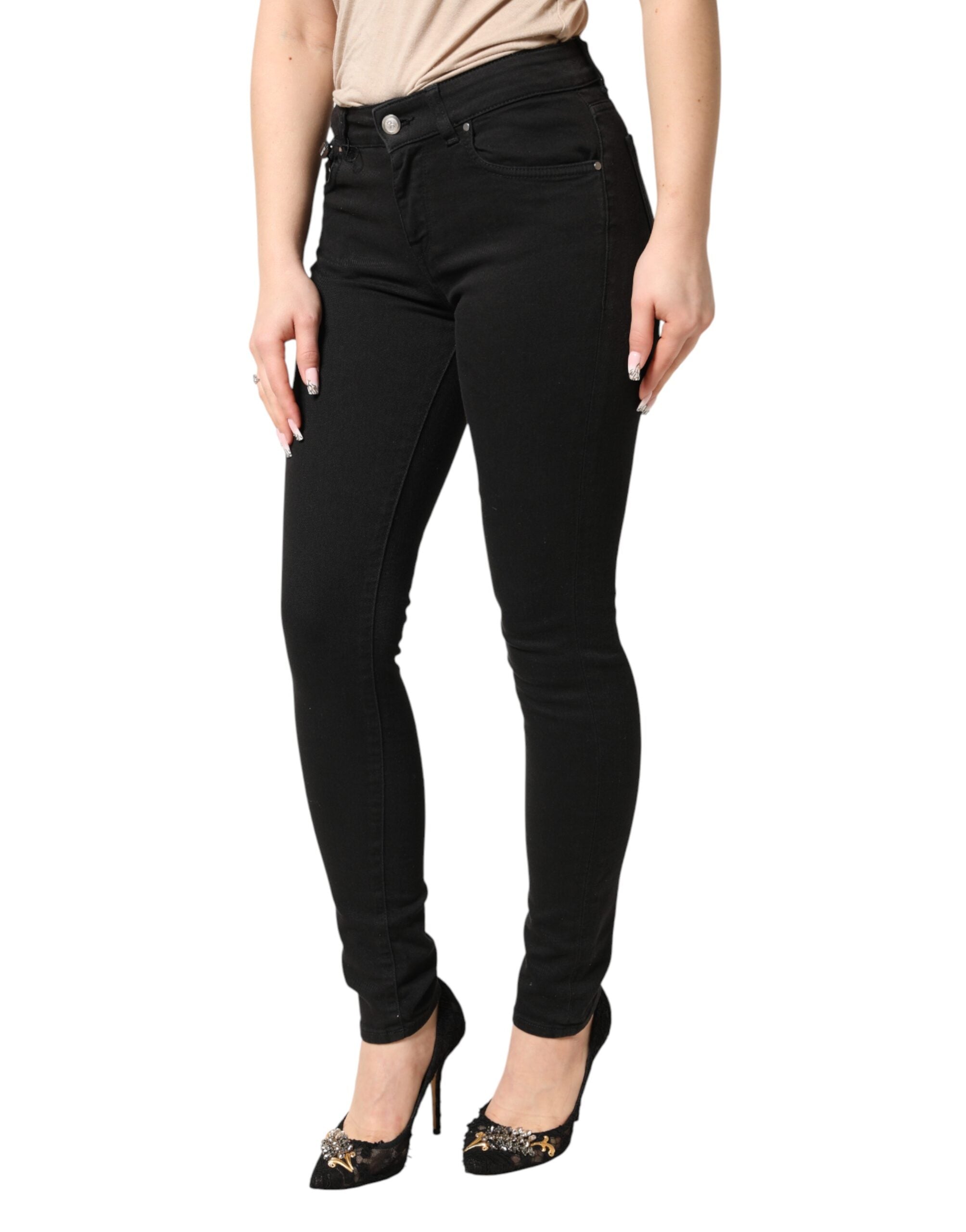 Jeans skinny en coton stretch noir de Dolce & Gabbana, denim ajusté et tendance, visible avec détails de couture.