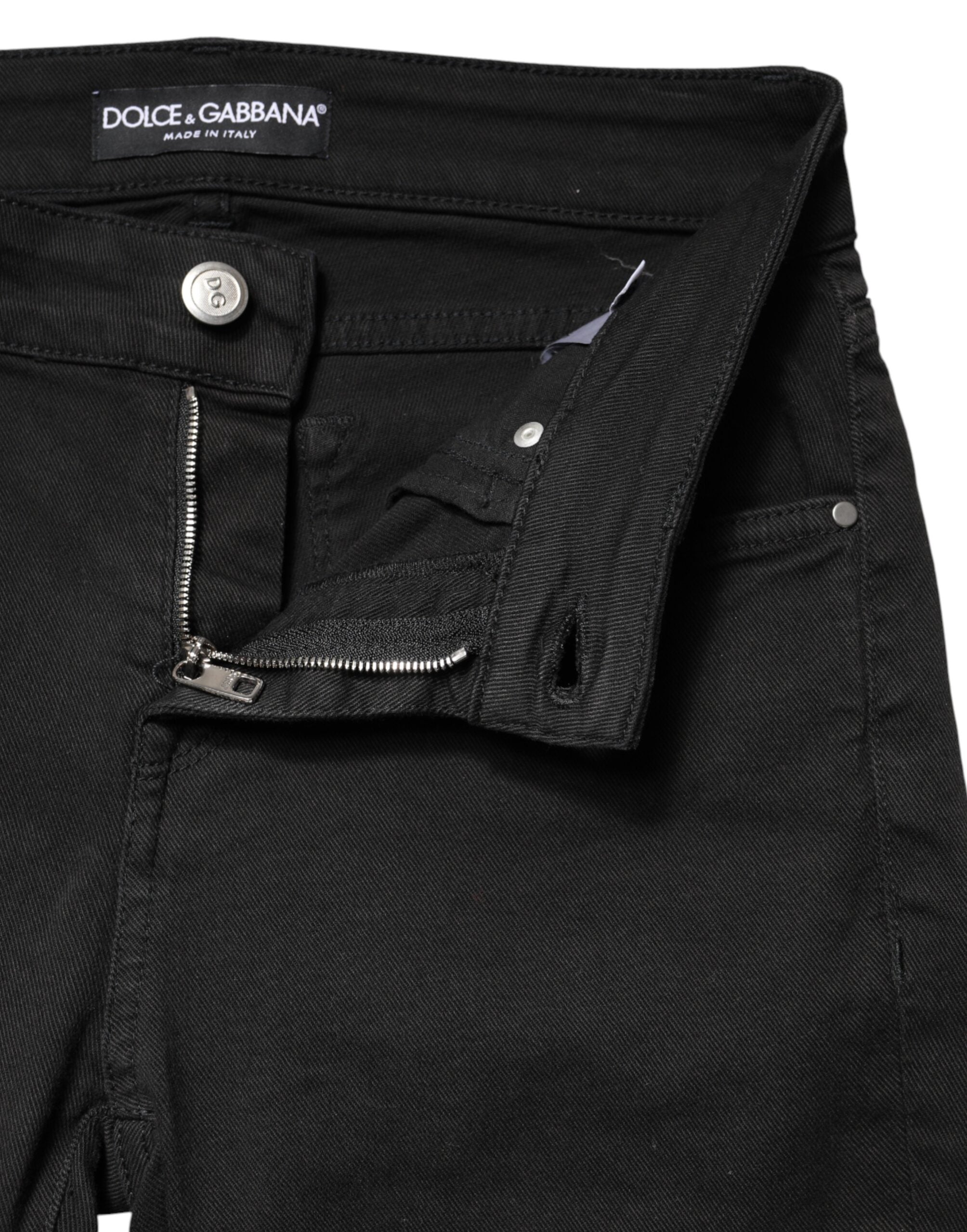 Jeans skinny en coton stretch noir de Dolce & Gabbana, coupe ajustée, détail classique et logo discret visible sur le jean.