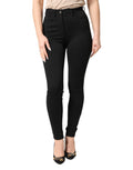 Pantalon skinny noir en nylon extensible à taille haute de Dolce & Gabbana, vue de face, mettant en valeur la coupe ajustée.