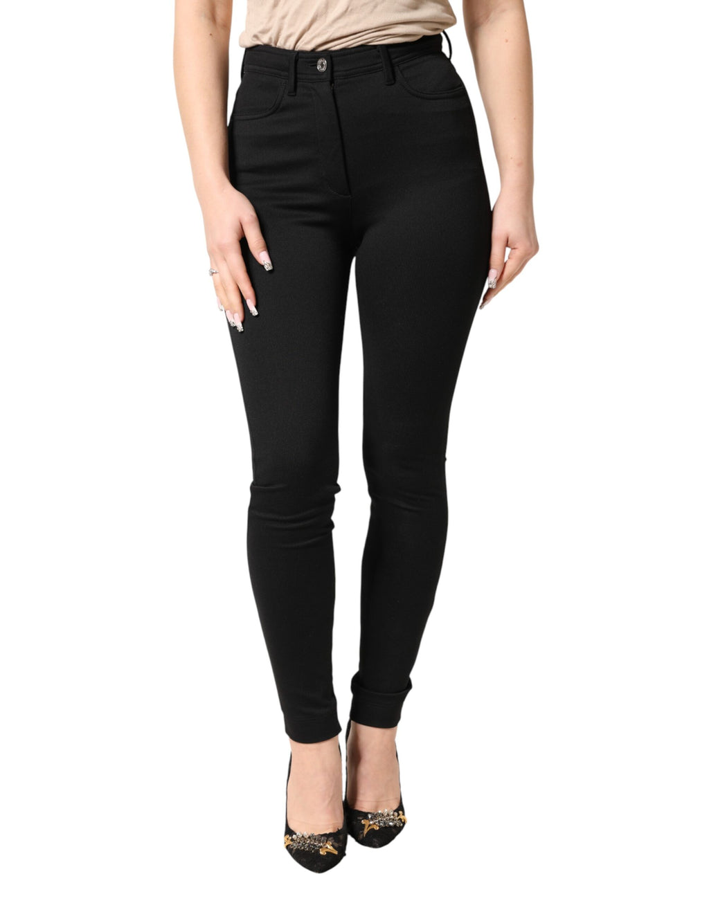 Pantalon noir en nylon stretch Dolce & Gabbana taille haute et skinny, ajusté et élégant, visible sur un mannequin.