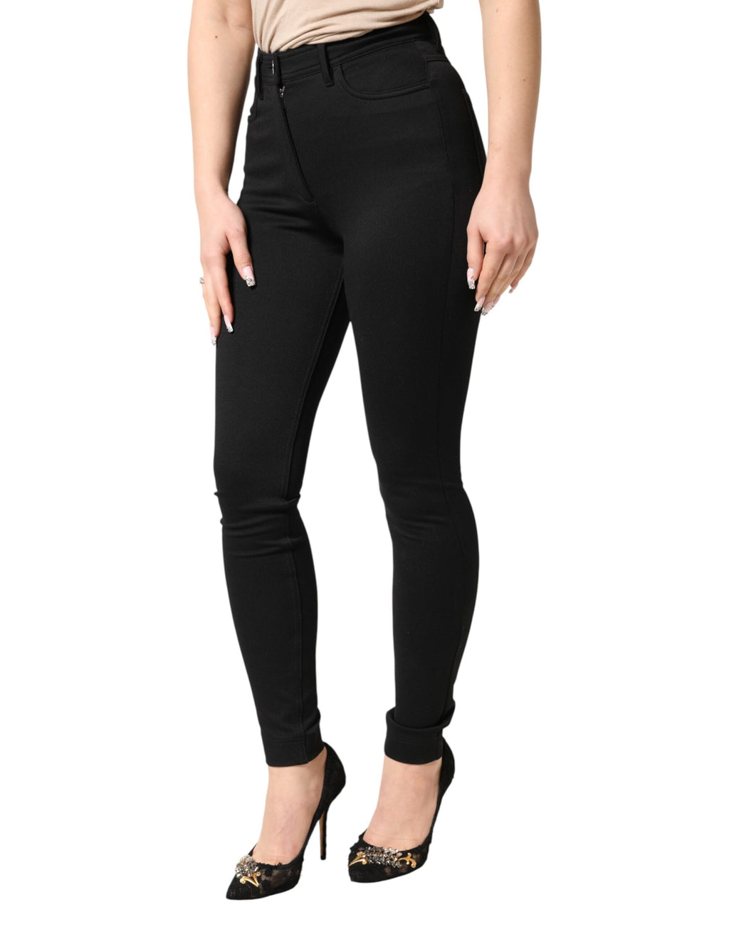 Pantalon noir en nylon extensible à taille haute de la marque Dolce & Gabbana, coupe skinny élégante.