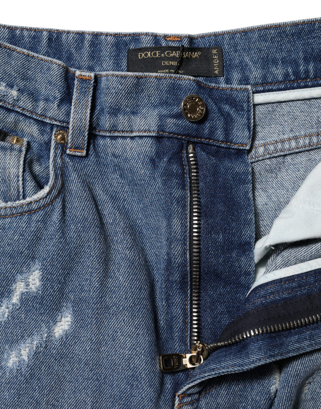 Jeans en denim bleu déchiré Dolce & Gabbana Amber en coton usé, style décontracté et tendance.