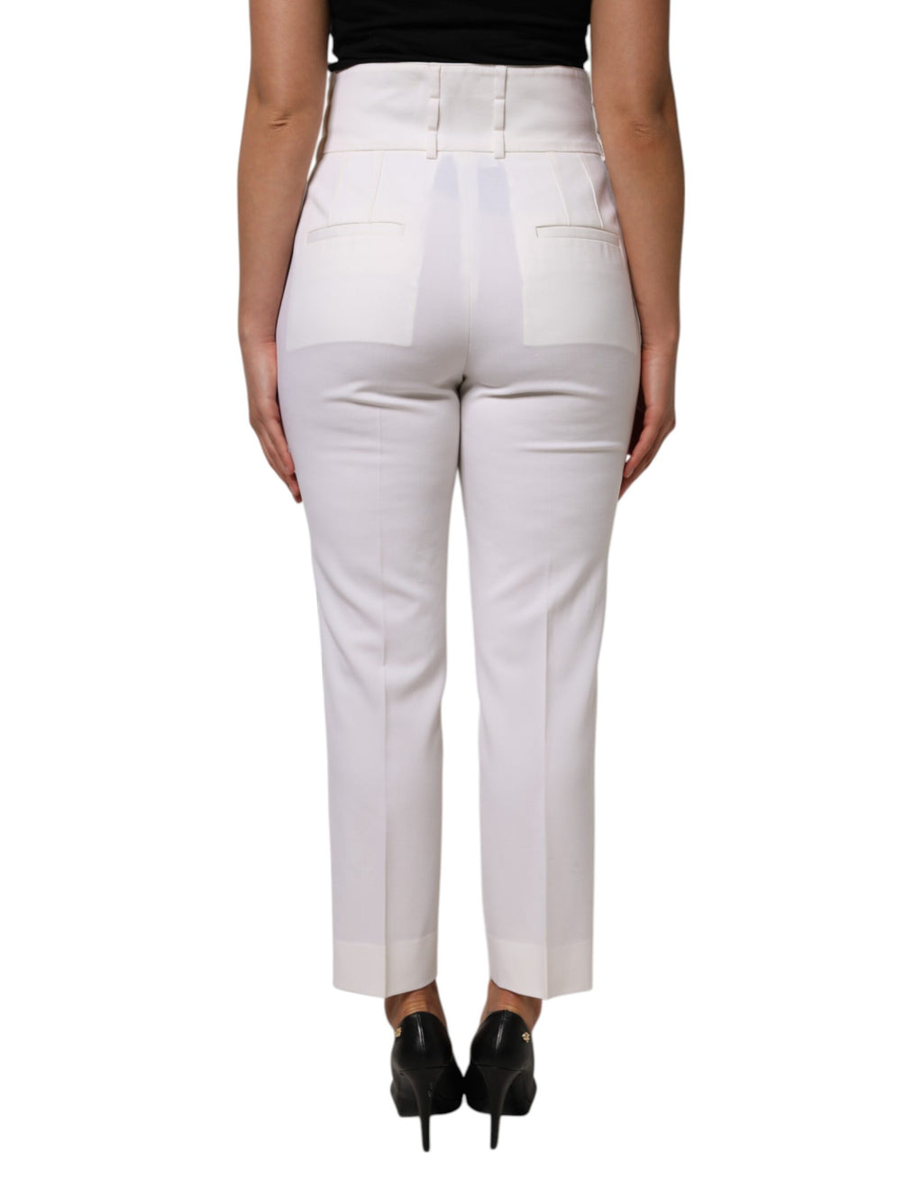 Pantalon en laine blanche Dolce & Gabbana, taille haute, coupe tapered, vue de face sur un fond neutre.