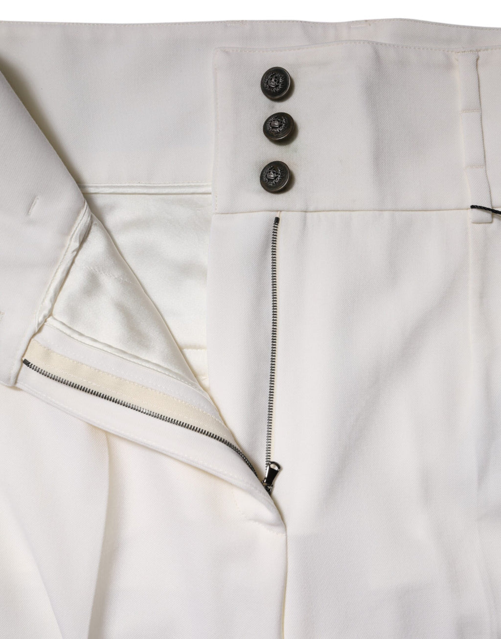Pantalon en laine blanche Dolce & Gabbana à taille haute, coupe tapered, élégant et sophistiqué.