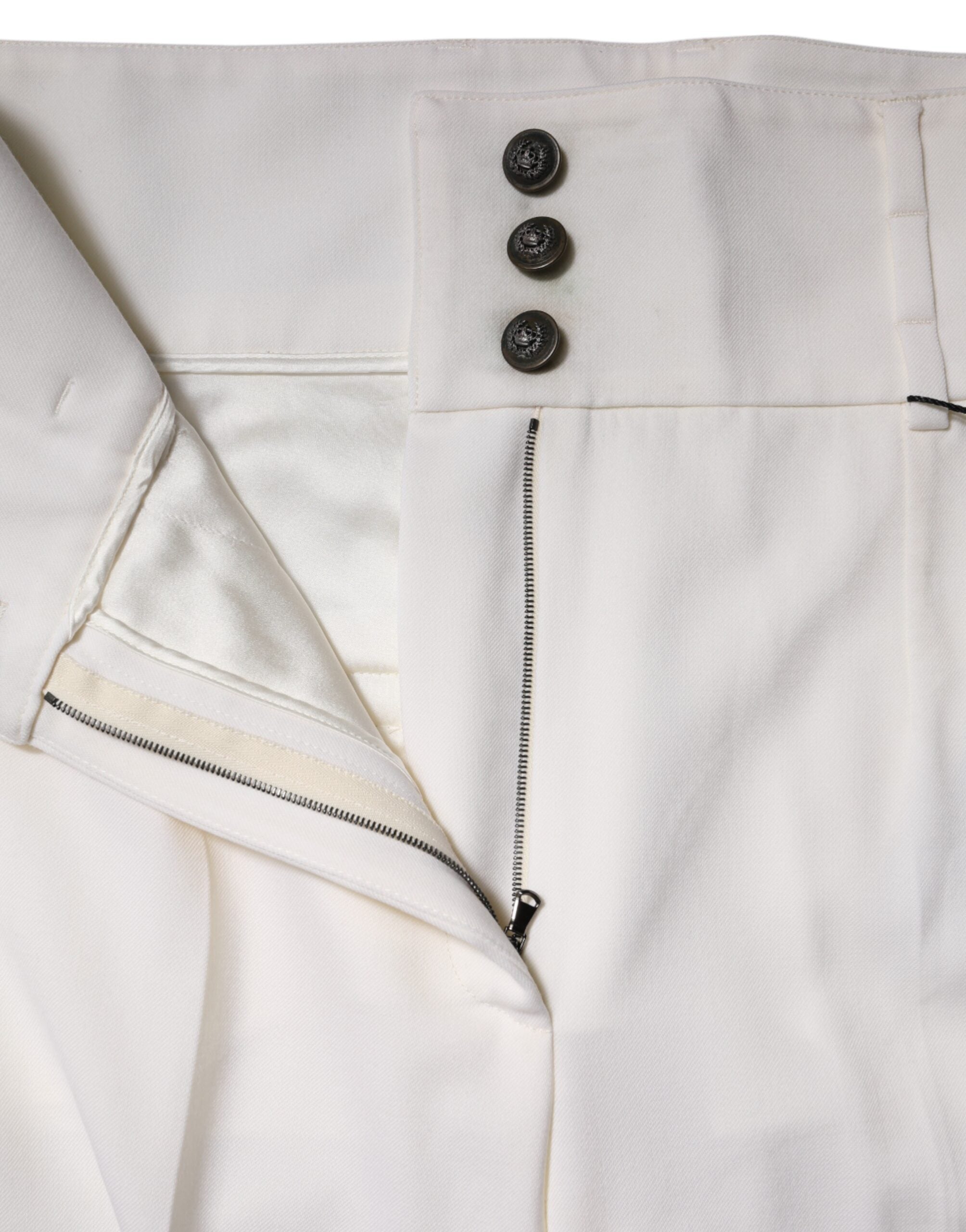 Pantalon en laine blanche Dolce & Gabbana à taille haute, coupe tapered, élégant et sophistiqué.