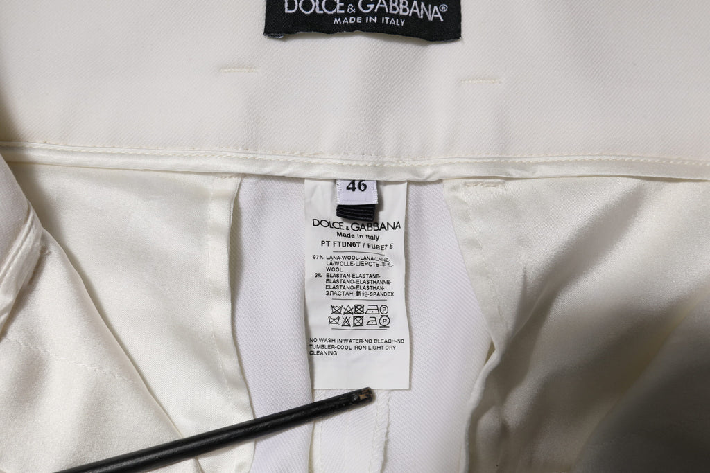 Pantalon blanc en laine Dolce & Gabbana, taille haute, coupe tapered, pour femme, vue de face.