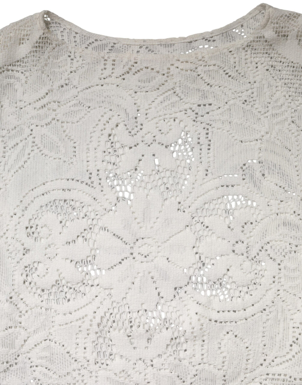 Chemisier blanc en coton avec broderies en dentelle Dolce & Gabbana, style élégant et féminin visible sur l'image.
