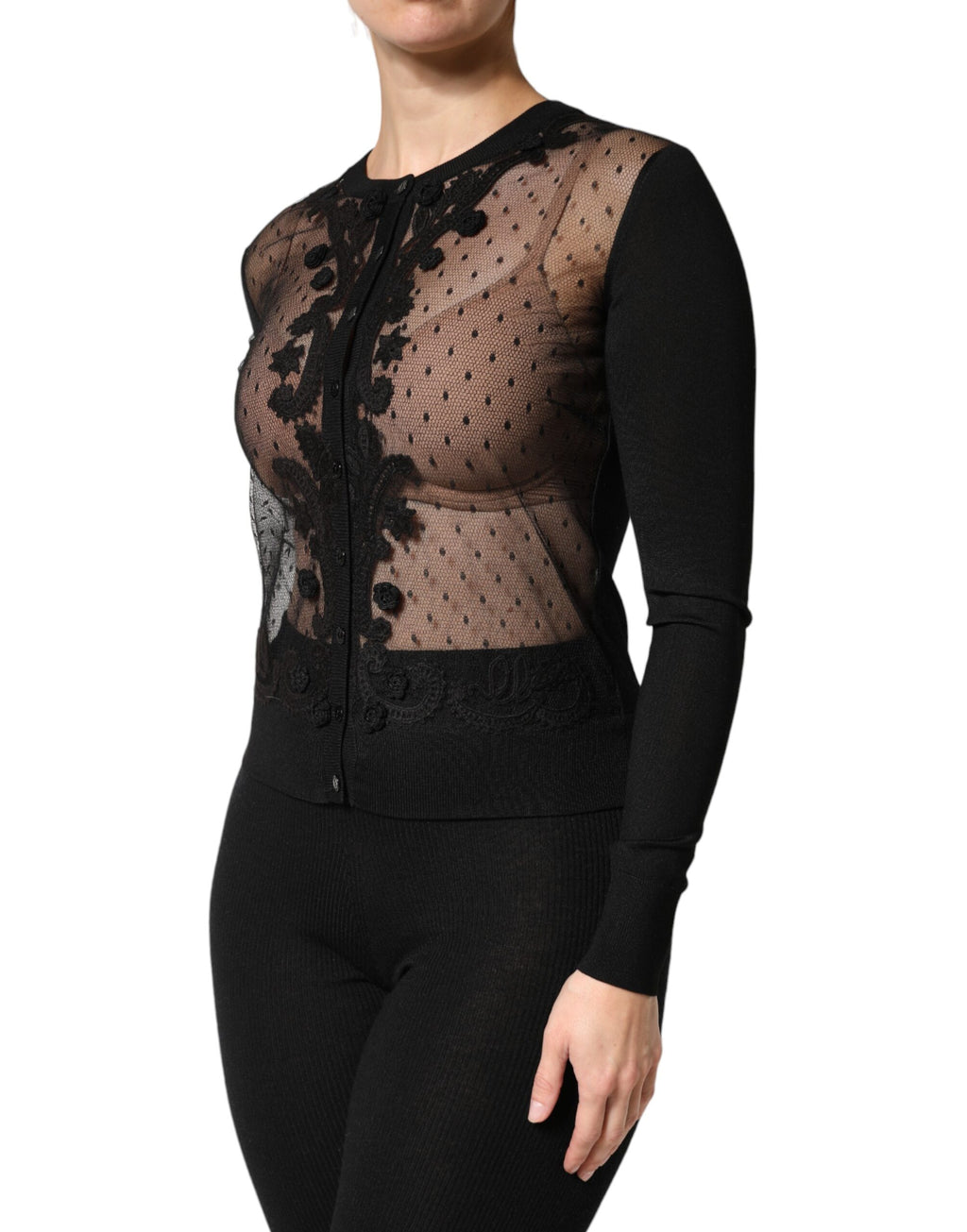 Cardigan en dentelle noire Dolce & Gabbana à boutons, vêtement élégant à manches longues et coupe ajustée.
