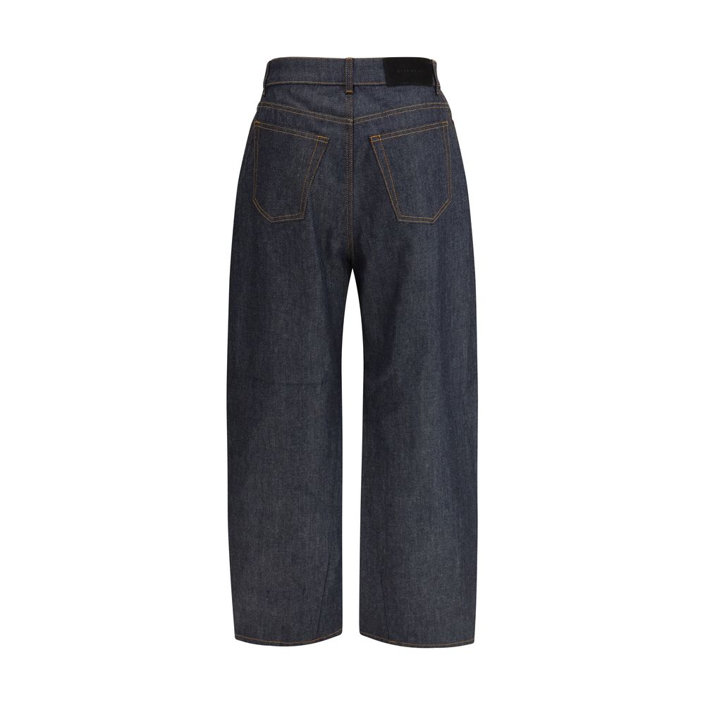 Jeans en denim bleu en coton Givenchy, coupe classique, visibles avec détails de couture et boutons.