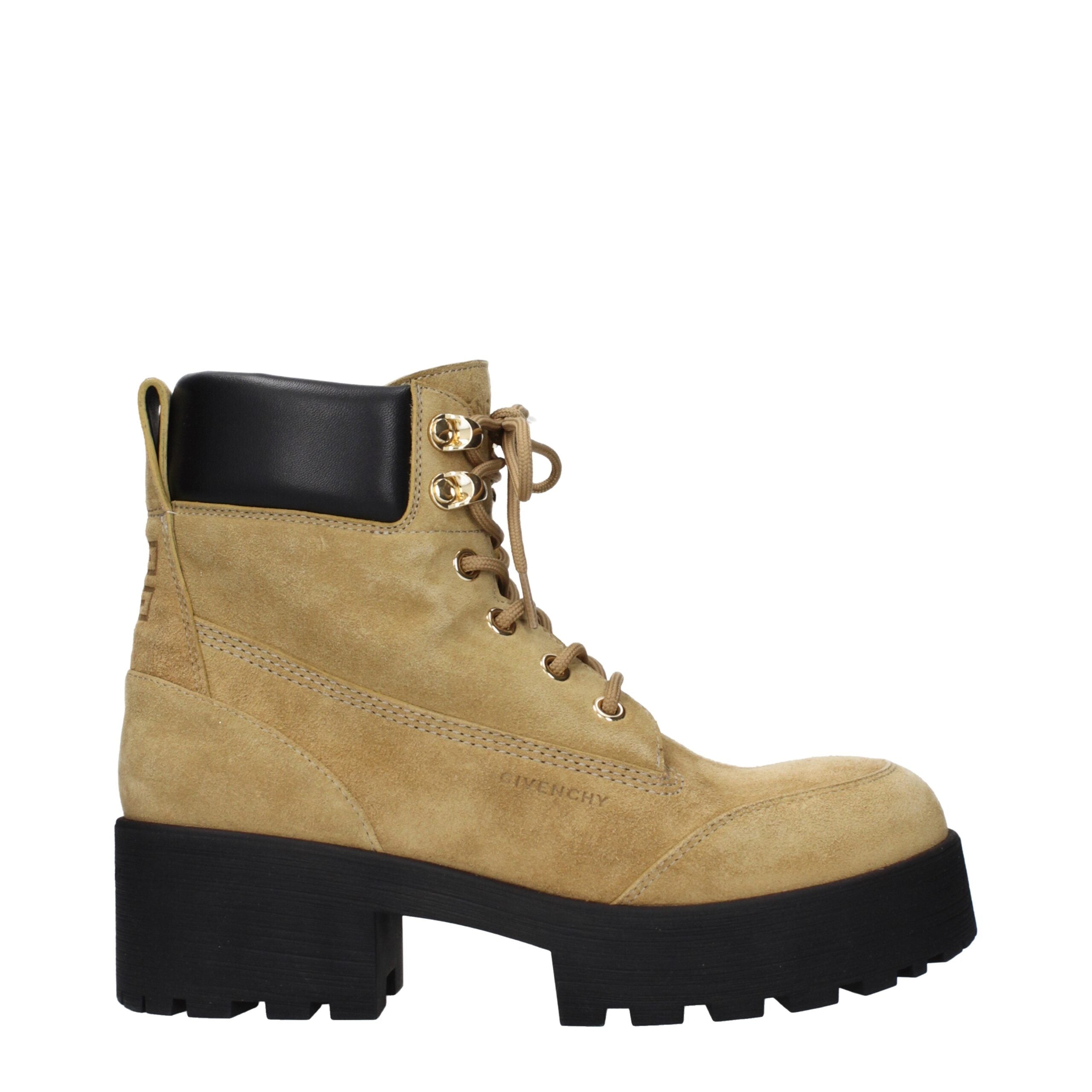 Bottes ankle en cuir marron Givenchy, style élégant, avec semelle en caoutchouc et design sophistiqué.