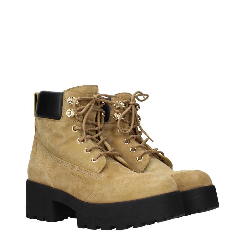 Bottes ankle en cuir marron Givenchy, élégantes et modernes, avec lacets et finition sophistiquée.
