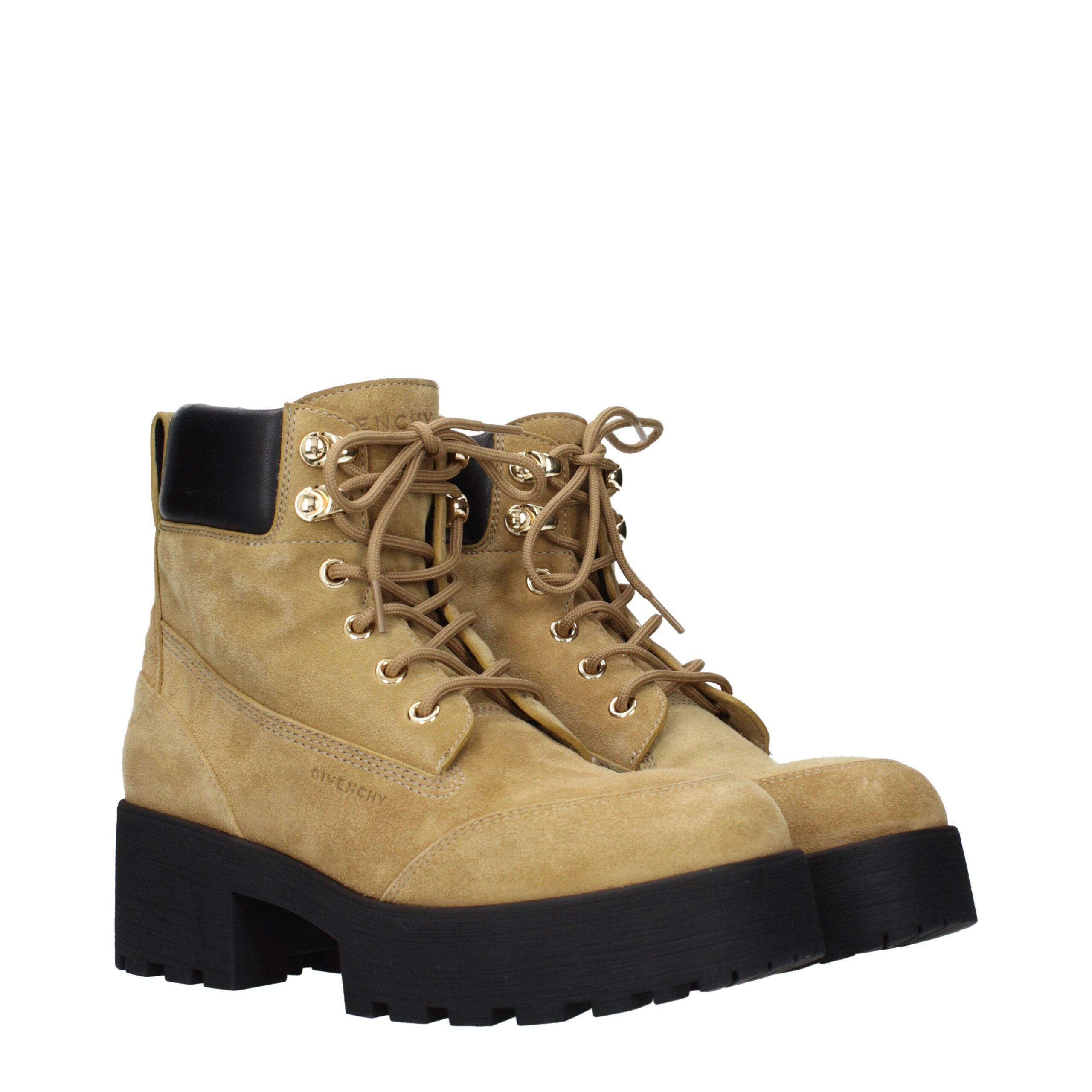 Bottes ankle en cuir marron Givenchy, élégantes et modernes, avec lacets et finition sophistiquée.