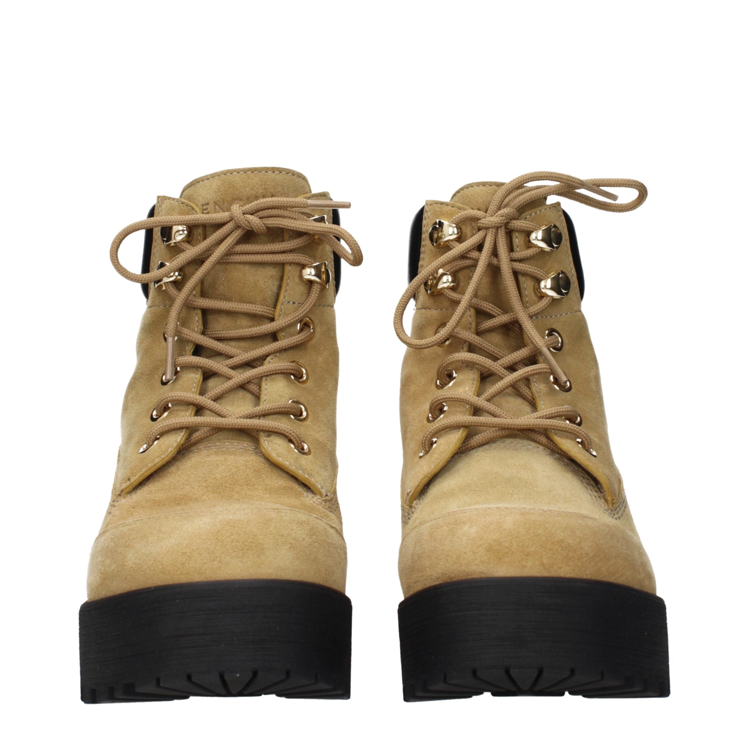 Bottes ankle en cuir marron de Givenchy, élégantes et sophistiquées, avec finition soignée et semelle en cuir.
