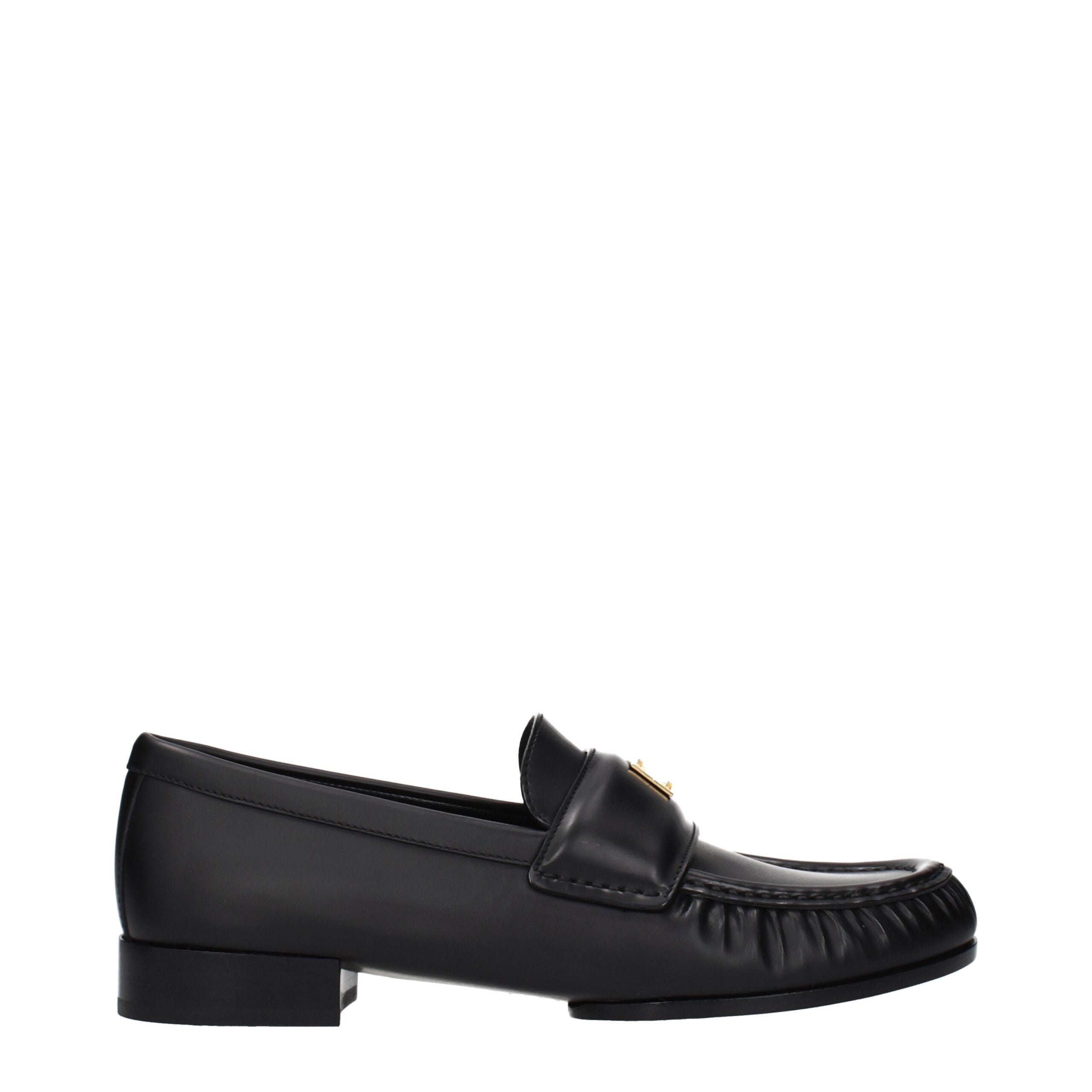 Mocassins Givenchy en cuir noir pour homme, à enfiler, avec semelle élégante et design sophistiqué.