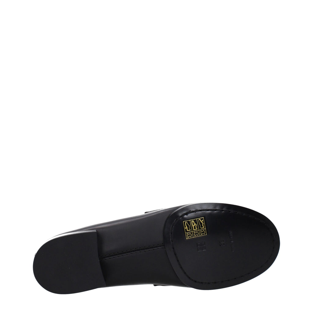 Mocassins noirs en cuir Givenchy à enfiler, semelle en caoutchouc, style élégant et sophistiqué pour homme.