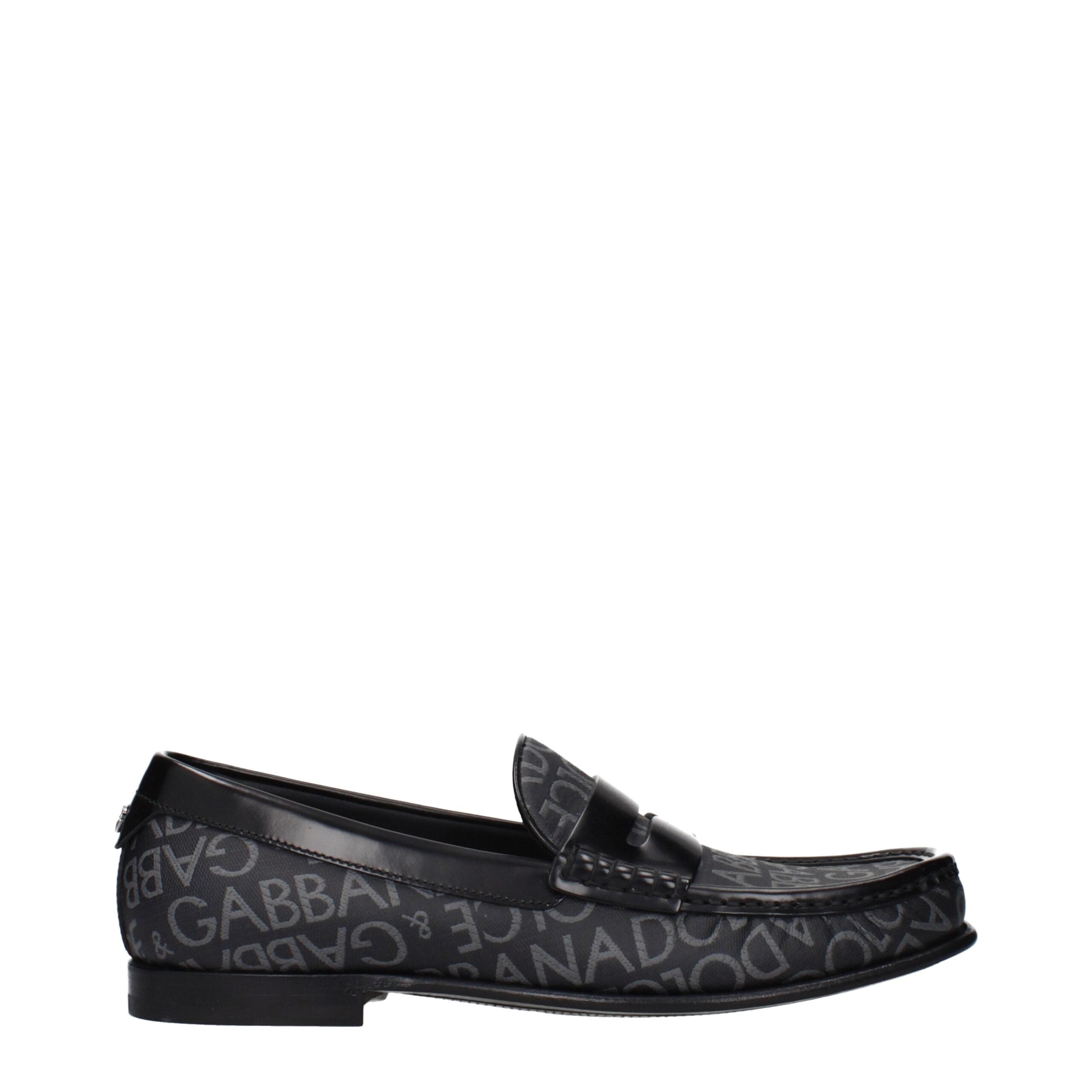 Chaussures mocassins slip-on en tissu noir de Dolce & Gabbana, élégantes et confortables pour un style sophistiqué.