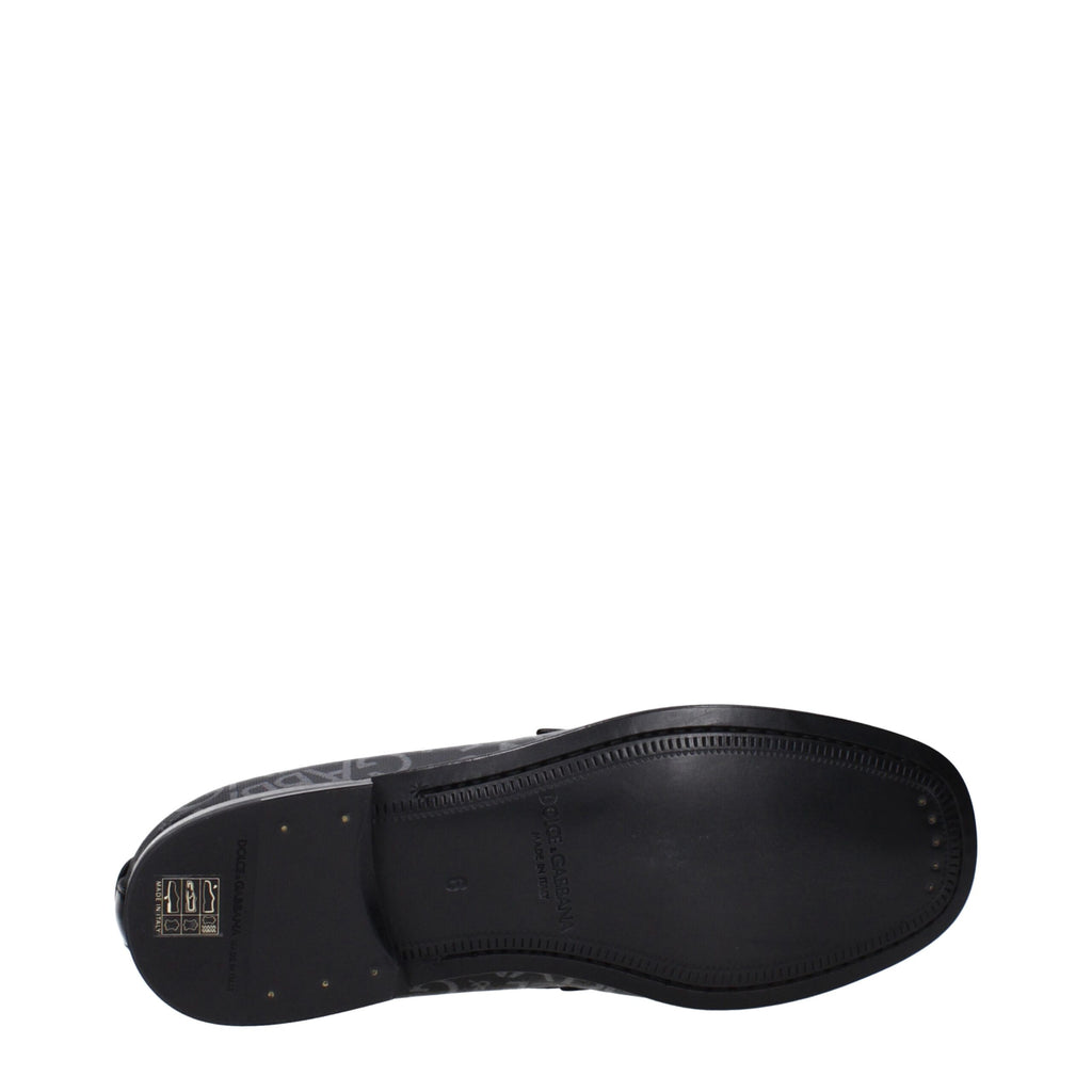 Chaussures mocassins Dolce & Gabbana en tissu noir, slip-on élégants pour homme, détails sophistiqués et finition soignée.