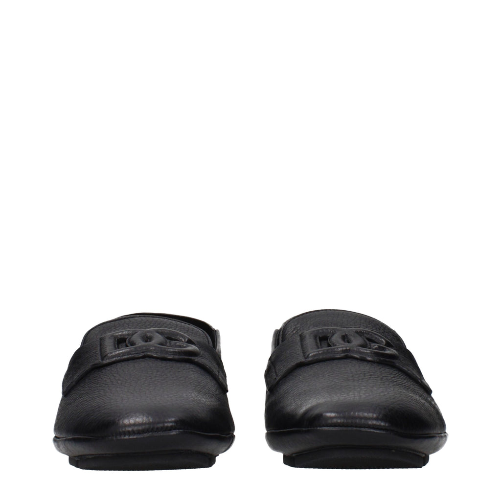 Chaussures mocassins en cuir noir Dolce & Gabbana pour homme, style slip-on avec semelle élégante et finition raffinée.