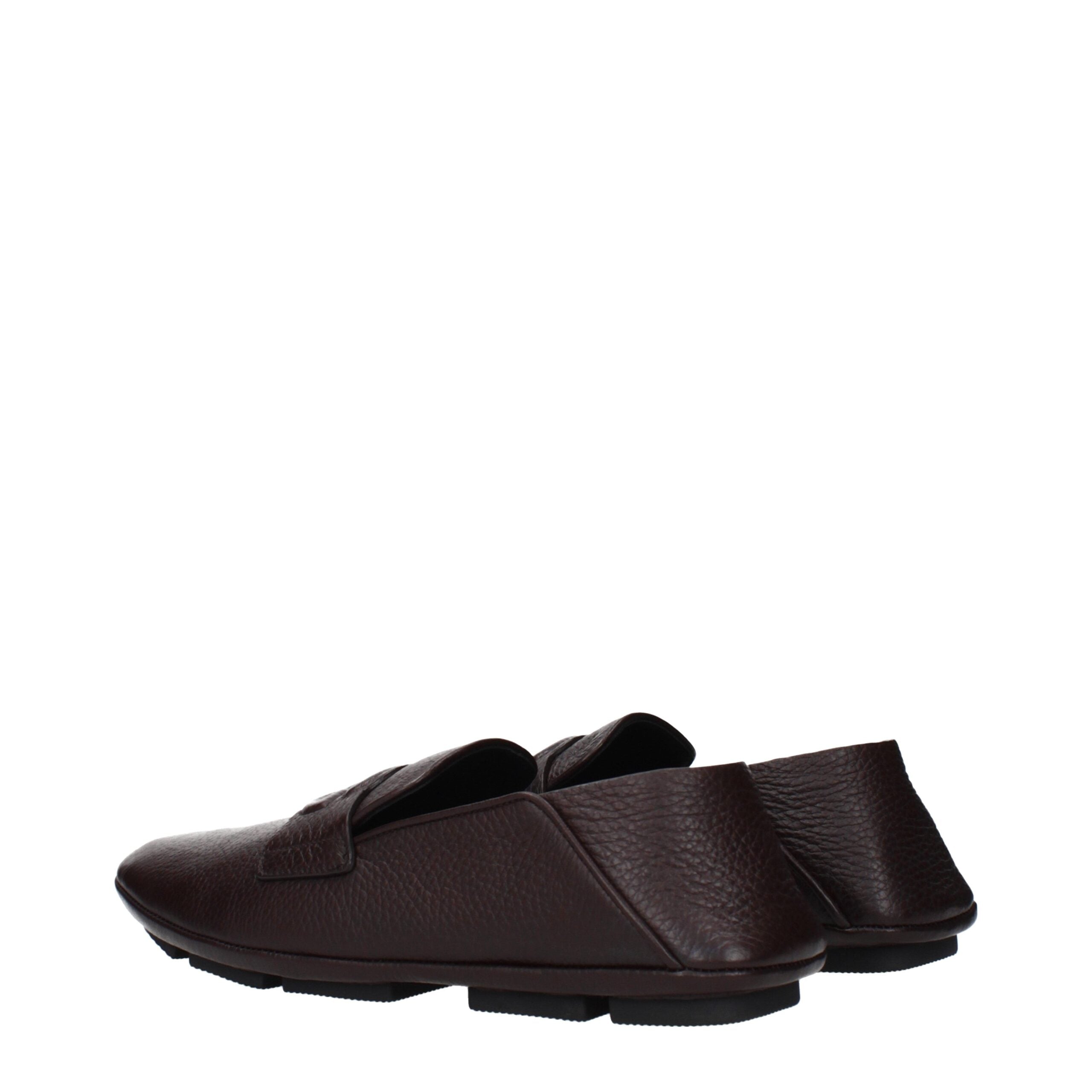 Mocassins en cuir marron Dolce & Gabbana à enfiler, élégants et confortables, avec finition lisse et semelle en cuir visible.