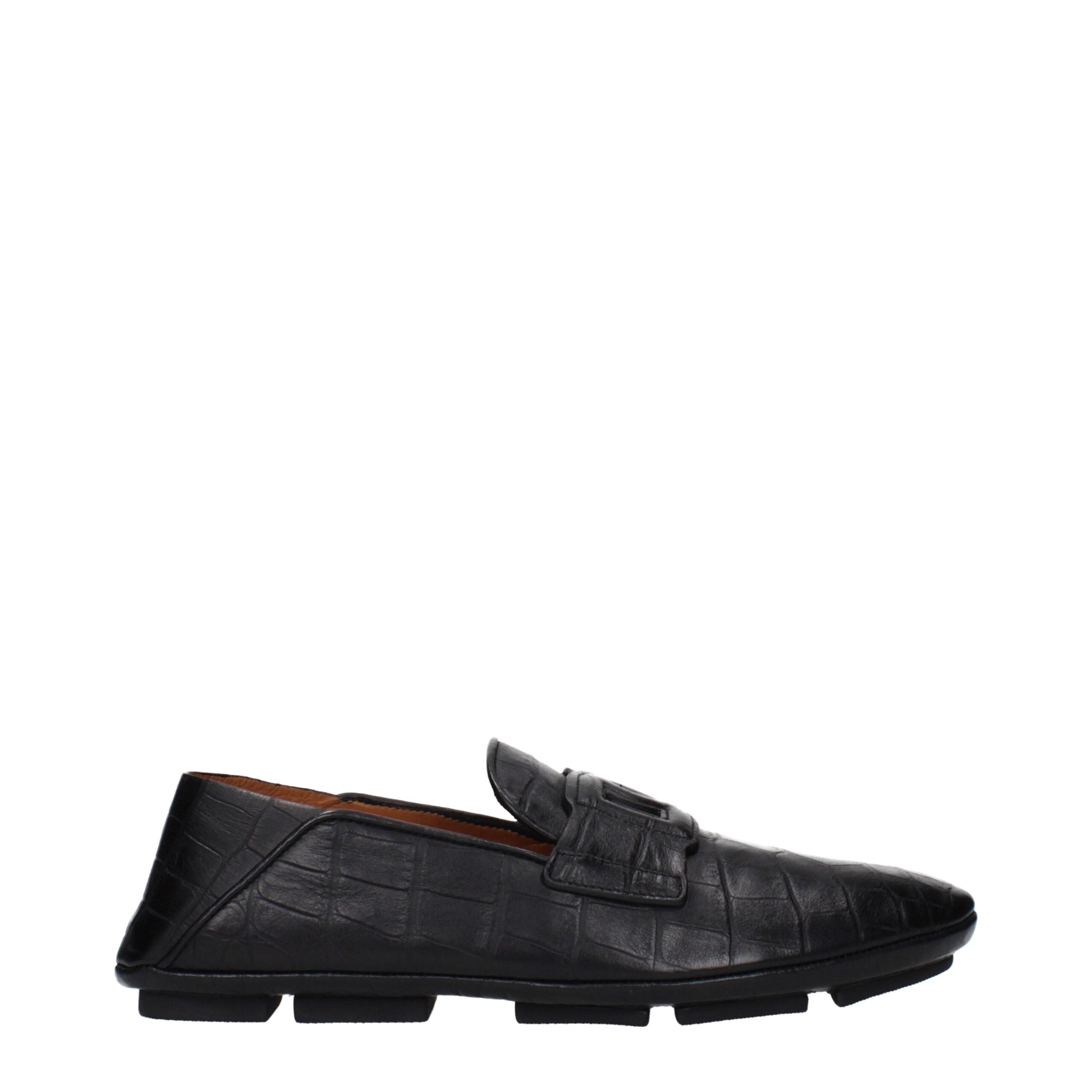Chaussures mocassins en cuir noir Dolce & Gabbana pour hommes, style slip-on, élégantes et confortables.