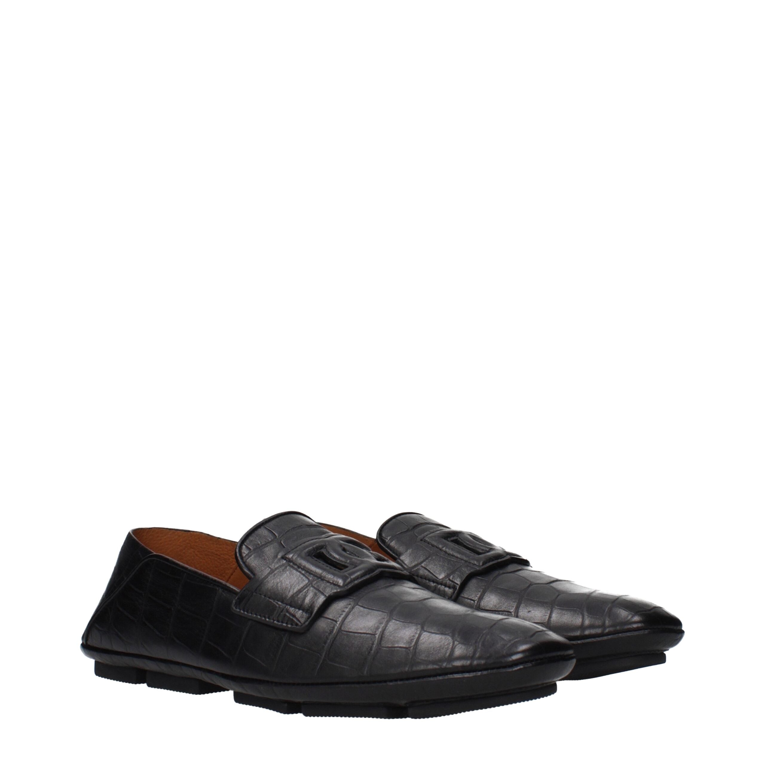 Mocassins noirs en cuir Dolce & Gabbana, chaussons décontractés à enfiler, avec finition élégante et semelle en cuir.