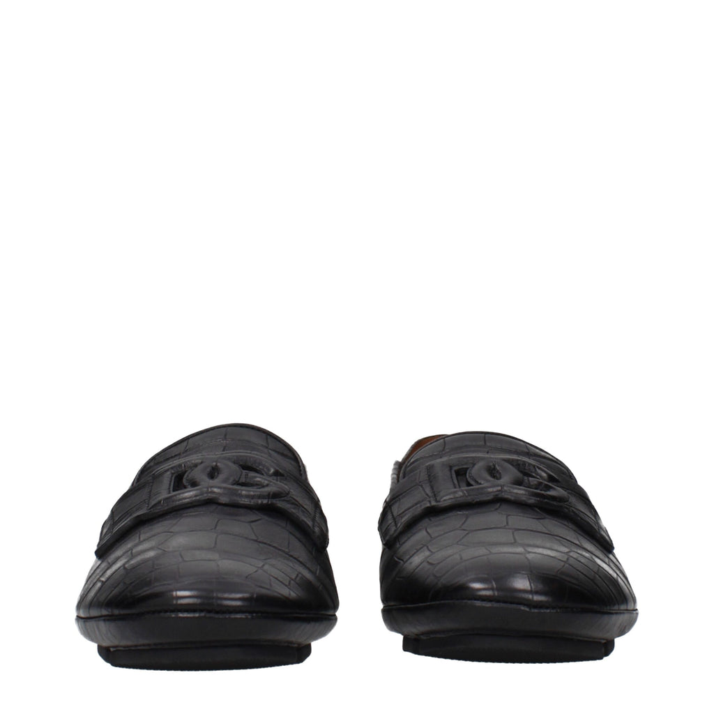 Mocassins noirs en cuir slip-on de Dolce & Gabbana pour homme, avec finition élégante et design classique.