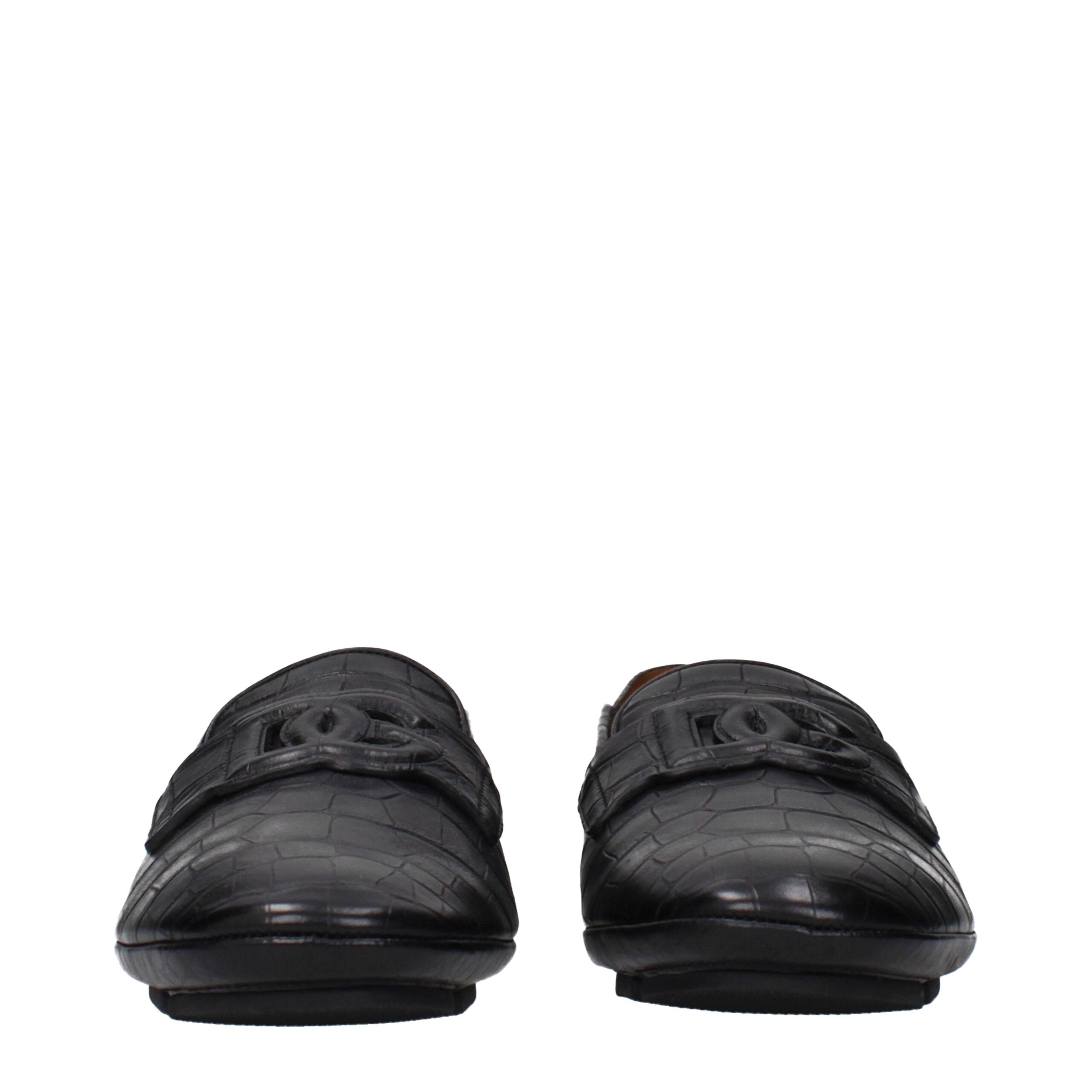 Mocassins noirs en cuir slip-on de Dolce & Gabbana pour homme, avec finition élégante et design classique.