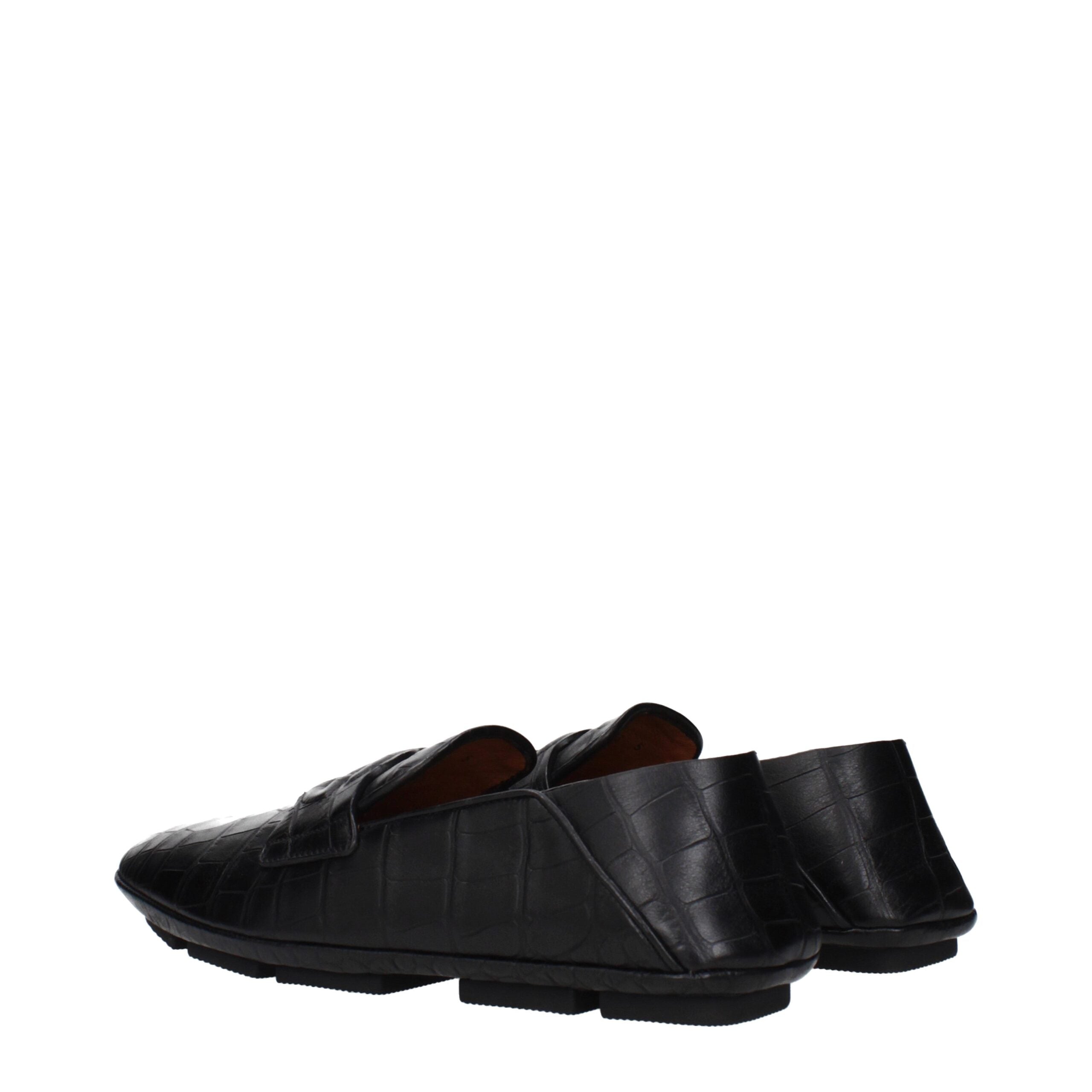 Mocassins en cuir noir Dolce & Gabbana, chaussons sans lacets avec finition élégante et semelle en cuir, pour homme.