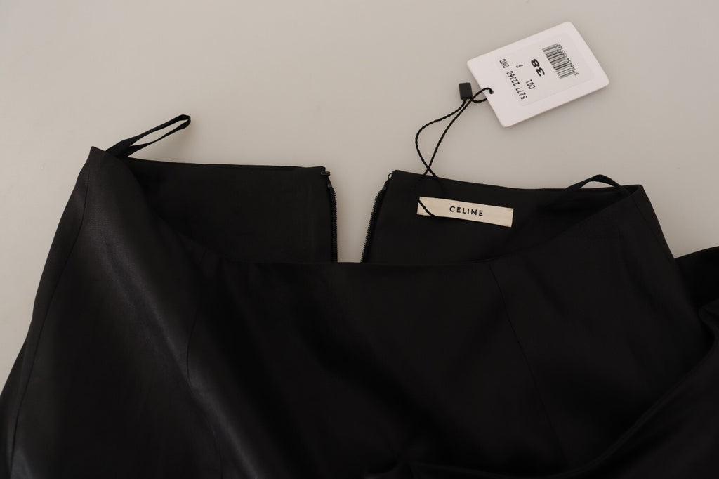 Jupe asymétrique à taille haute en acétate noire de Celine, style portefeuille et coupe élégante.