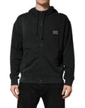Sweat-shirt à capuche noir Dolce & Gabbana pour homme avec fermeture éclair pleine longueur et logo subtil.