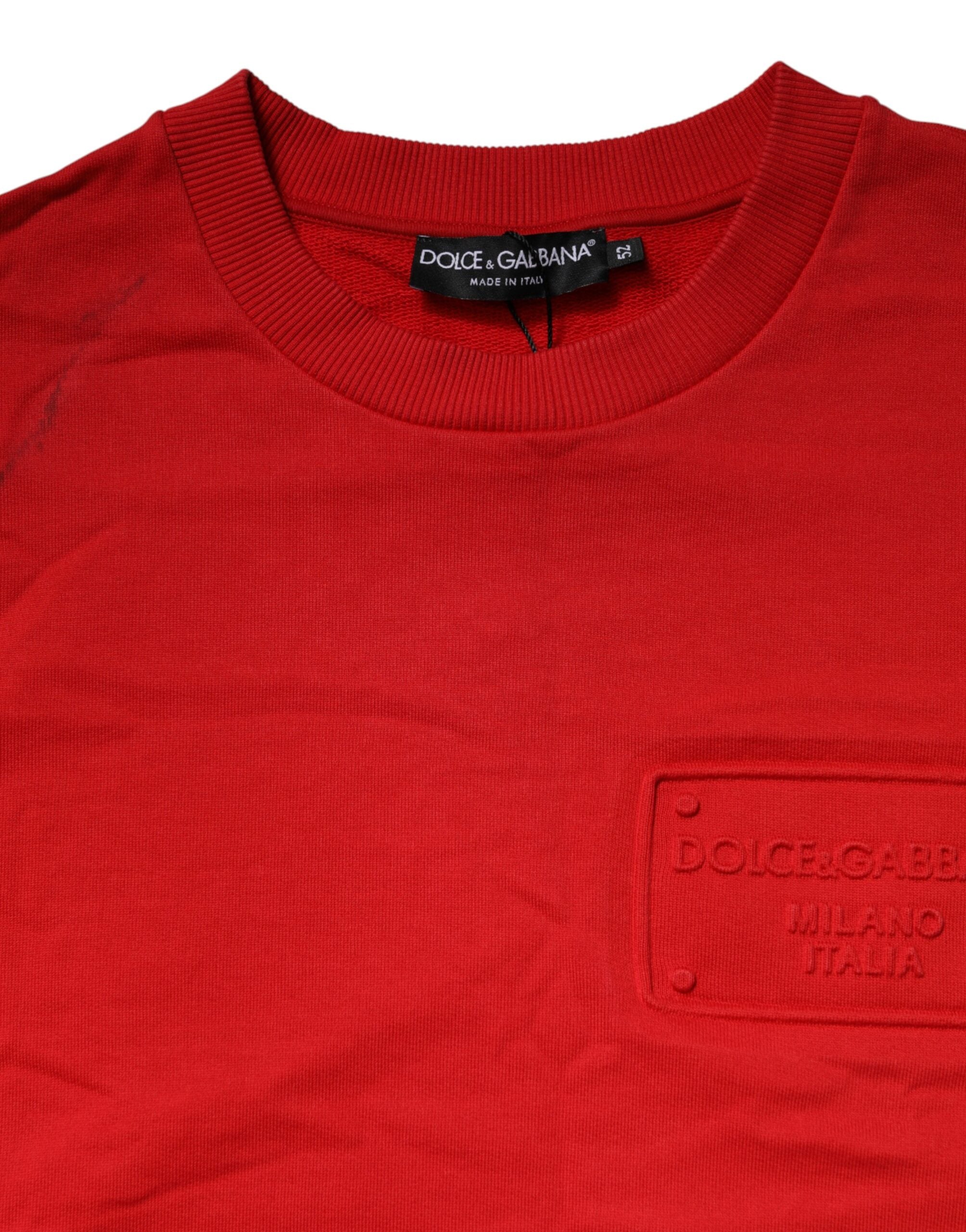 Sweatshirt en coton rouge Dolce & Gabbana avec logo, col rond et style décontracté visible sur l'image.