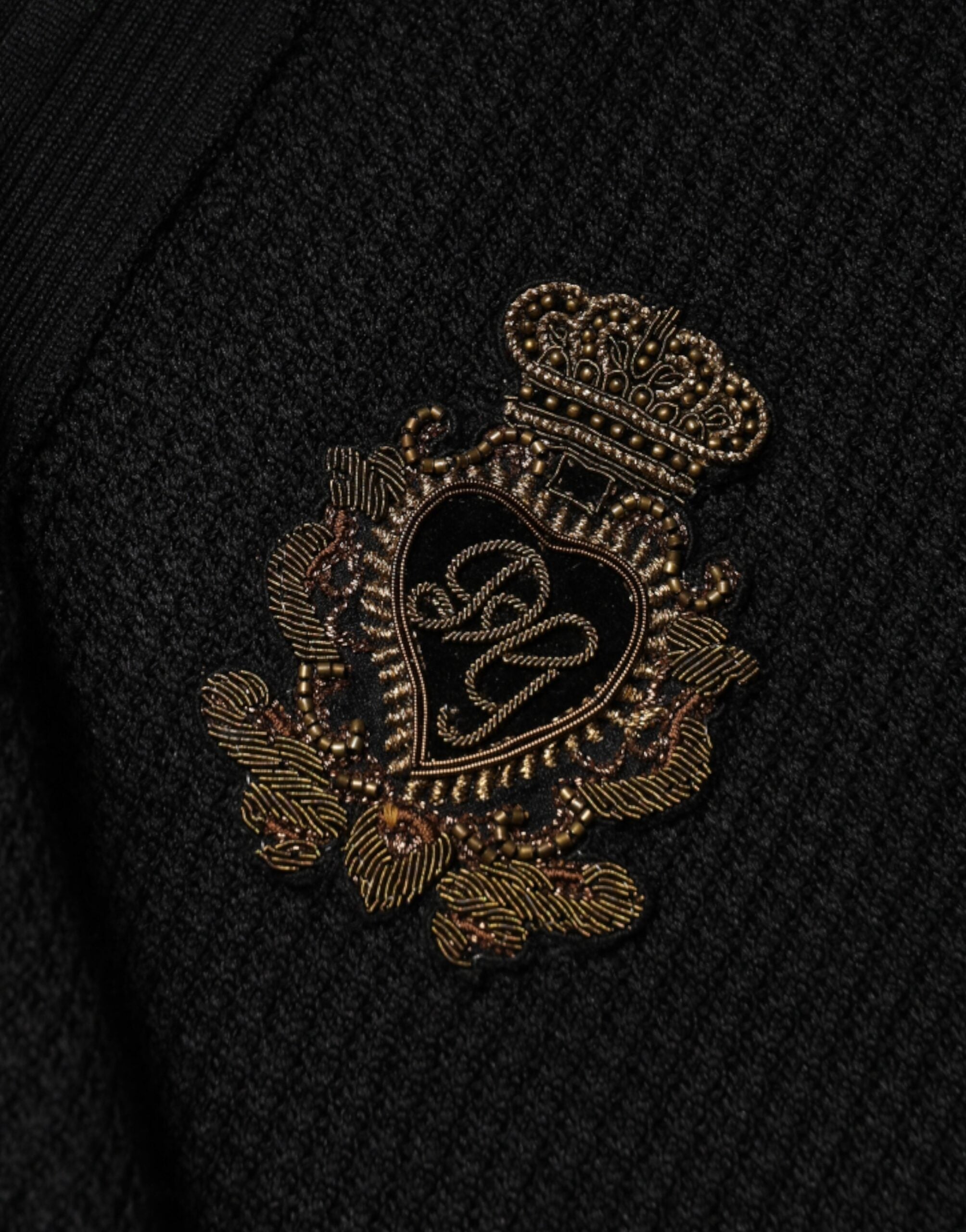 Pull à manches longues noir Dolce & Gabbana Crest pour homme, doux et élégant, avec logo en relief sur la poitrine.