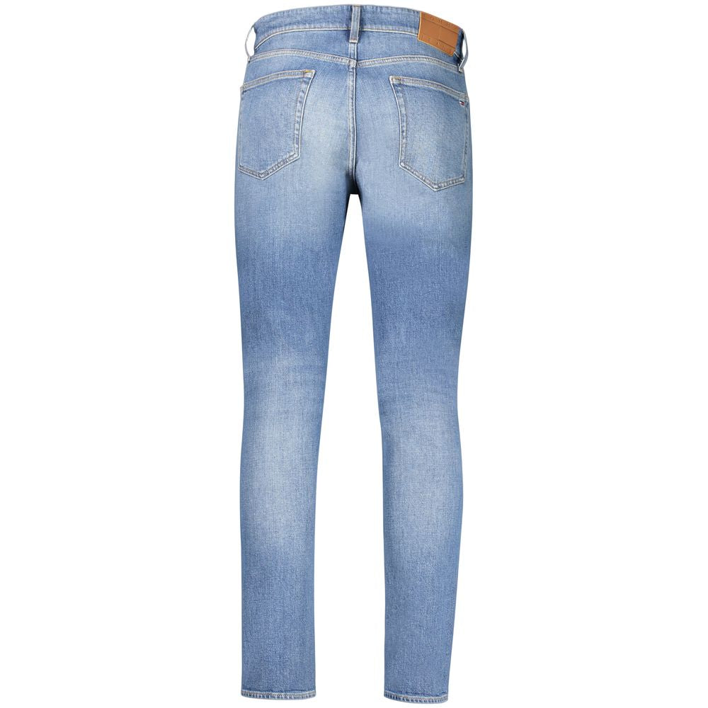 Jeans homme Tommy Hilfiger en coton bleu avec coupe classique, détails de couture et logo sur la poche arrière.