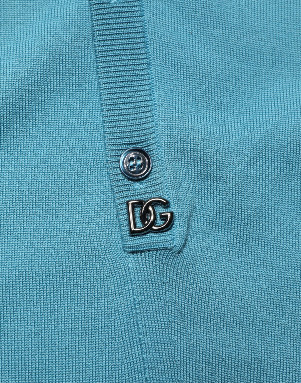 Pull en laine vert sarcelle Dolce & Gabbana avec col, manches longues et coupe classique, parfait pour un style élégant et confortable.