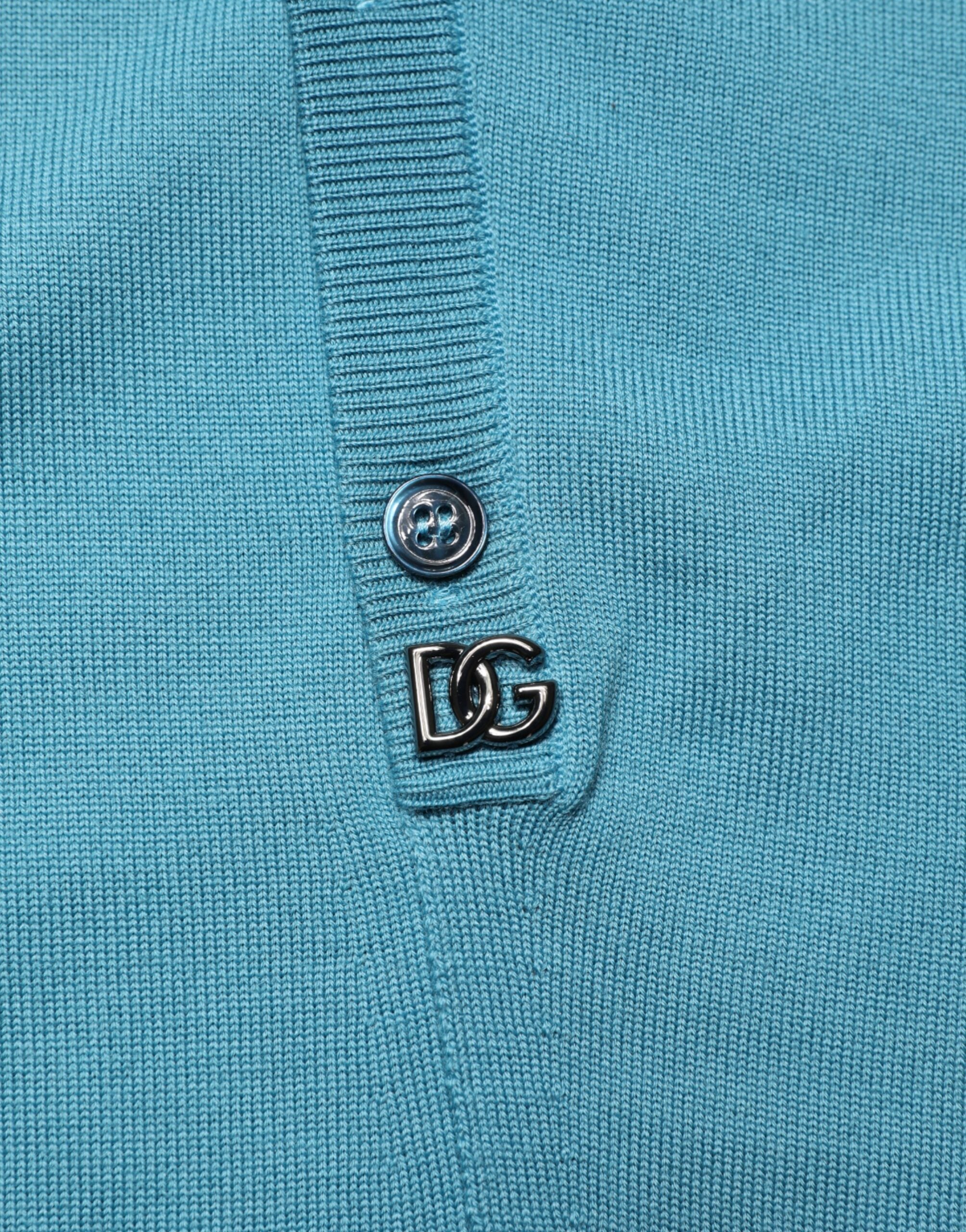 Pull en laine vert sarcelle Dolce & Gabbana avec col, manches longues et coupe classique, parfait pour un style élégant et confortable.