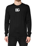 Pull-over homme en laine noire Dolce & Gabbana avec col rond, style classique et élégance sophistiquée.