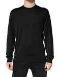 Pull en soie noir pour homme de Dolce & Gabbana, sweat-shirt à col rond avec tissu élégant et finition soignée visible sur l'image.
