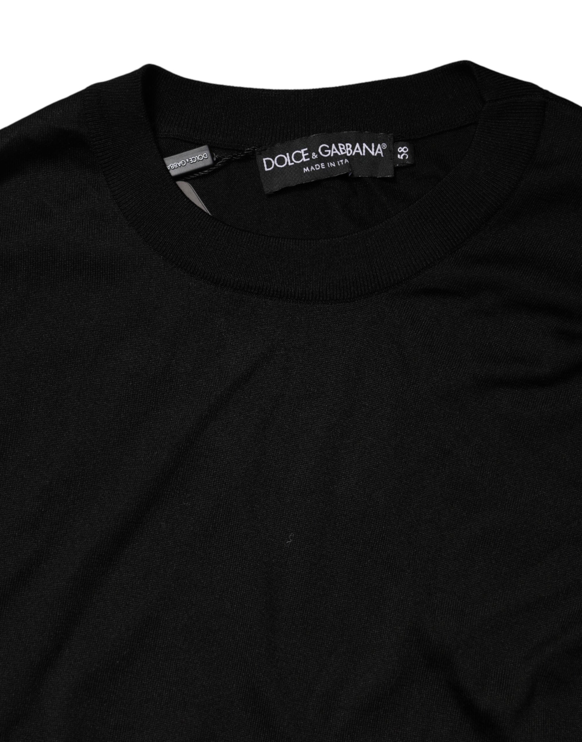 Pull en soie noir Dolce & Gabbana pour homme à col rond, élégance classique et tissu doux visible dans l'image.