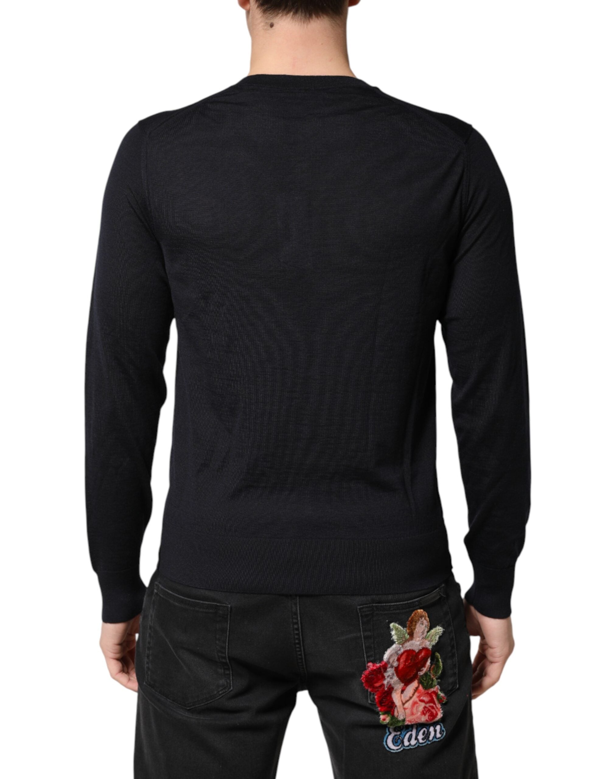 Pull en cachemire noir Dolce & Gabbana pour homme, col en V, style élégant et confortable.