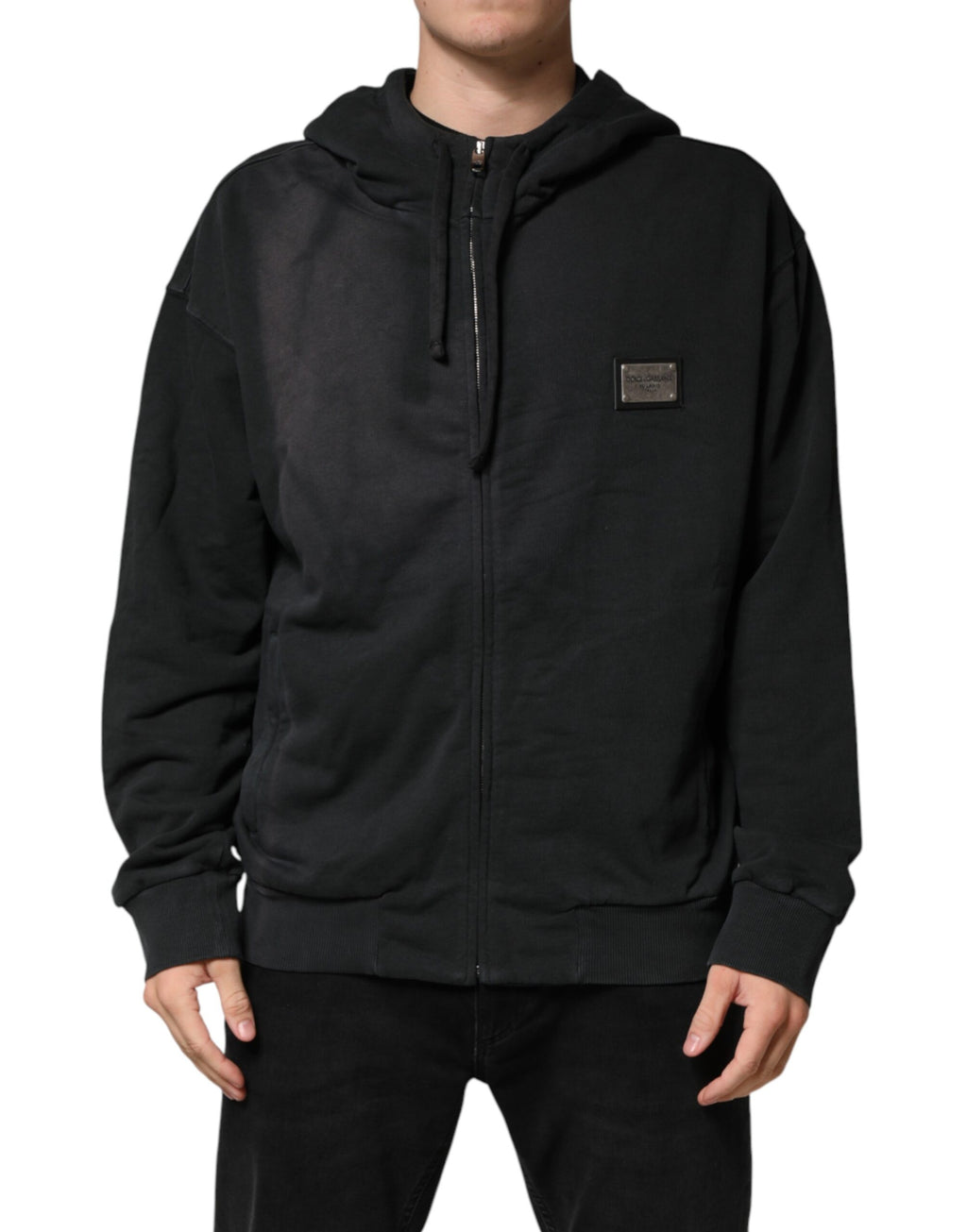 Sweat à capuche zippé noir Dolce & Gabbana avec logo, tissu molletonné et détails de fermeture éclair visible.