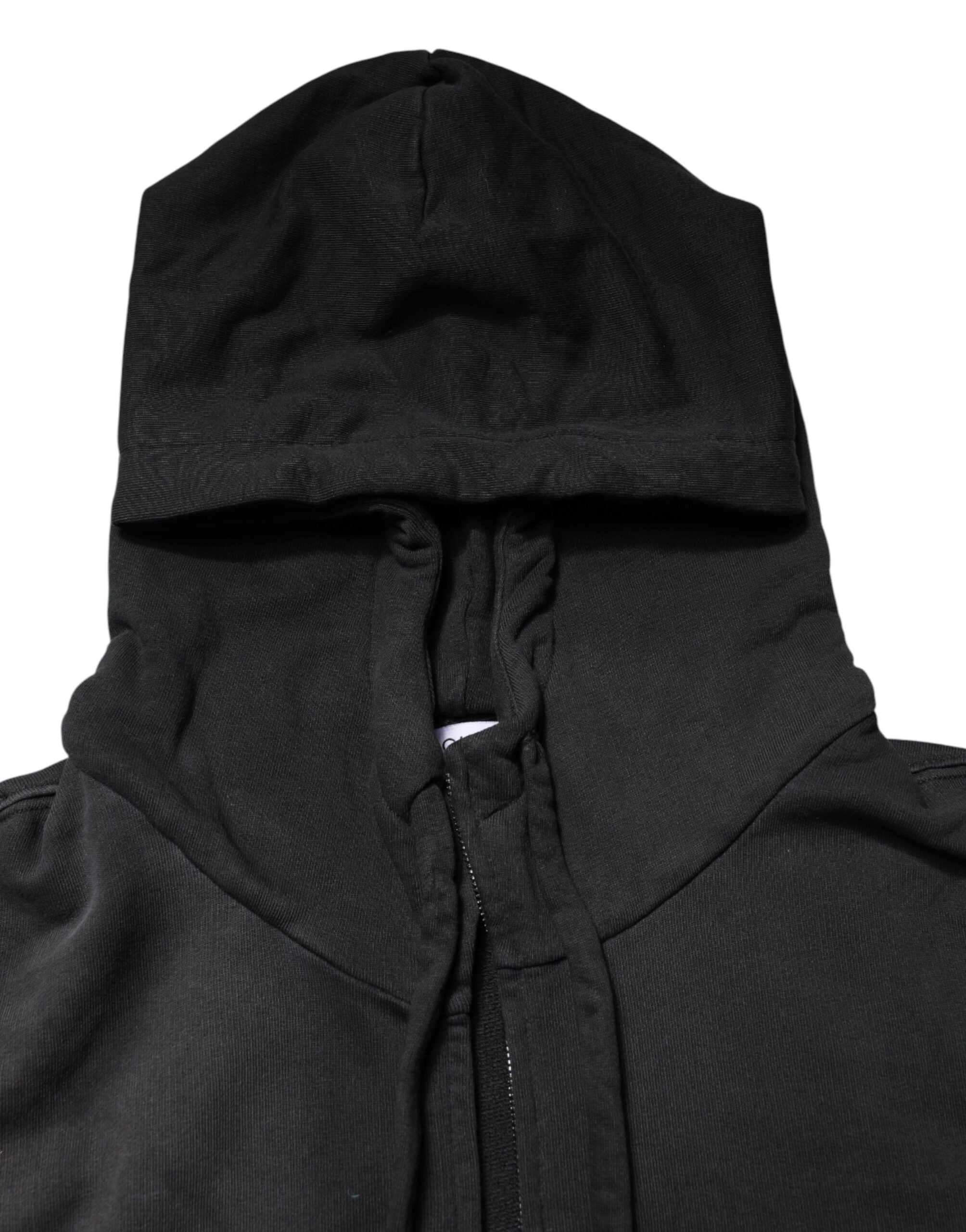 Sweat à capuche zippé noir Dolce & Gabbana avec logo, en coton doux, porté sur un modèle, vue de face.
