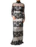 Robe longue noire et blanche en dentelle et soie mélangée de Dolce & Gabbana, coupe maxi, élégante et raffinée.