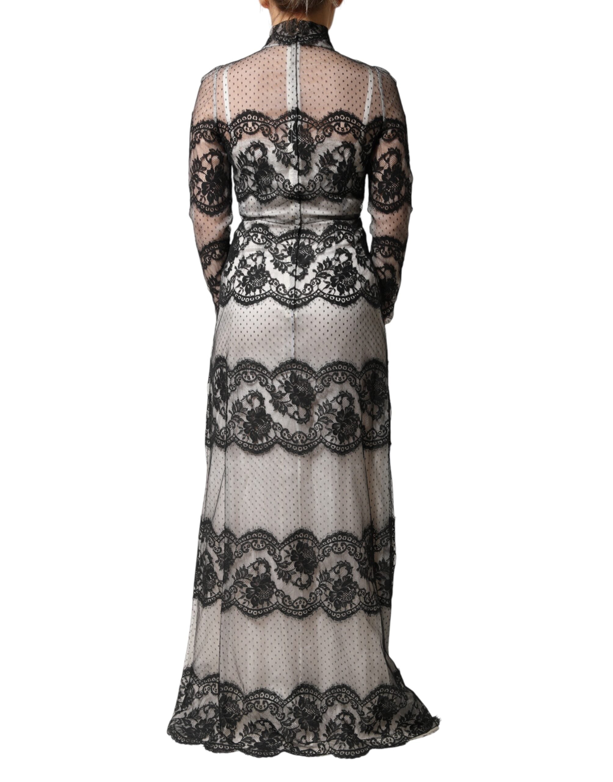 Robe longue en dentelle noire et blanche en soie mélangée de Dolce & Gabbana, style maxi sheath, élégante et sophistiquée.