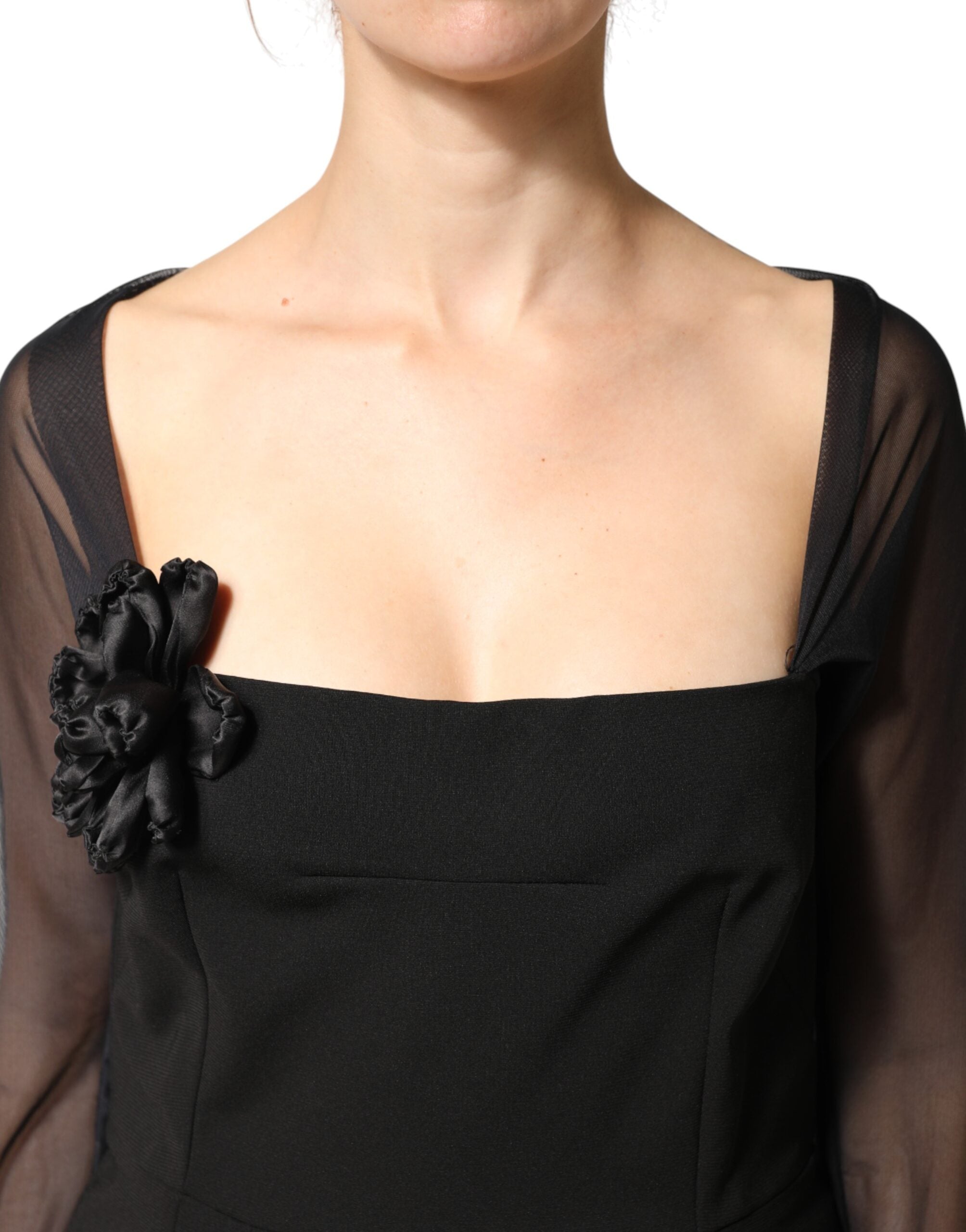Robe midi noire transparente Dolce & Gabbana avec yoke en rosaces et coupe ajustée, élégante et sophistiquée.