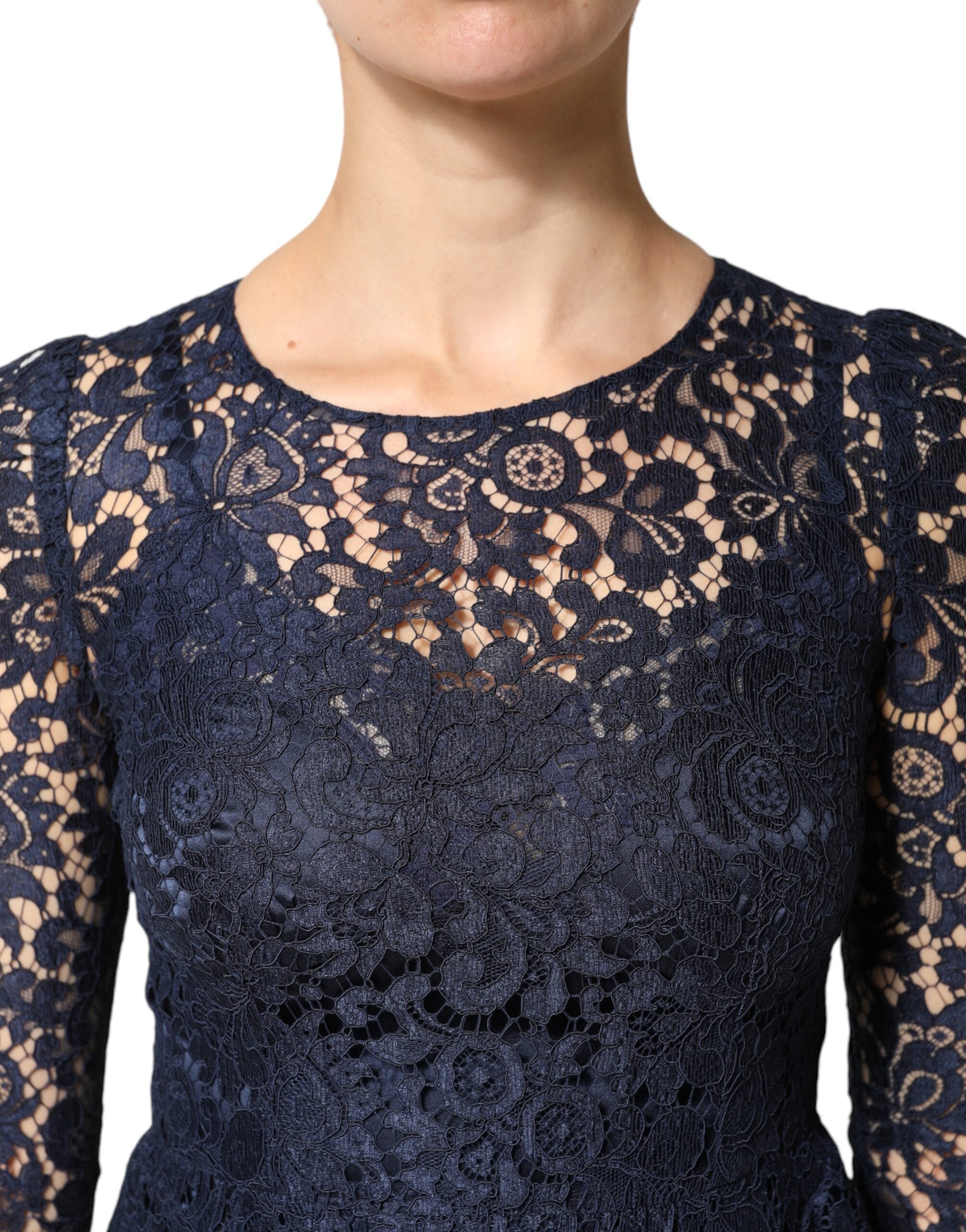 Robe bleu en dentelle Dolce & Gabbana, style évasé à volants, longueur au genou, élégante et sophistiquée.