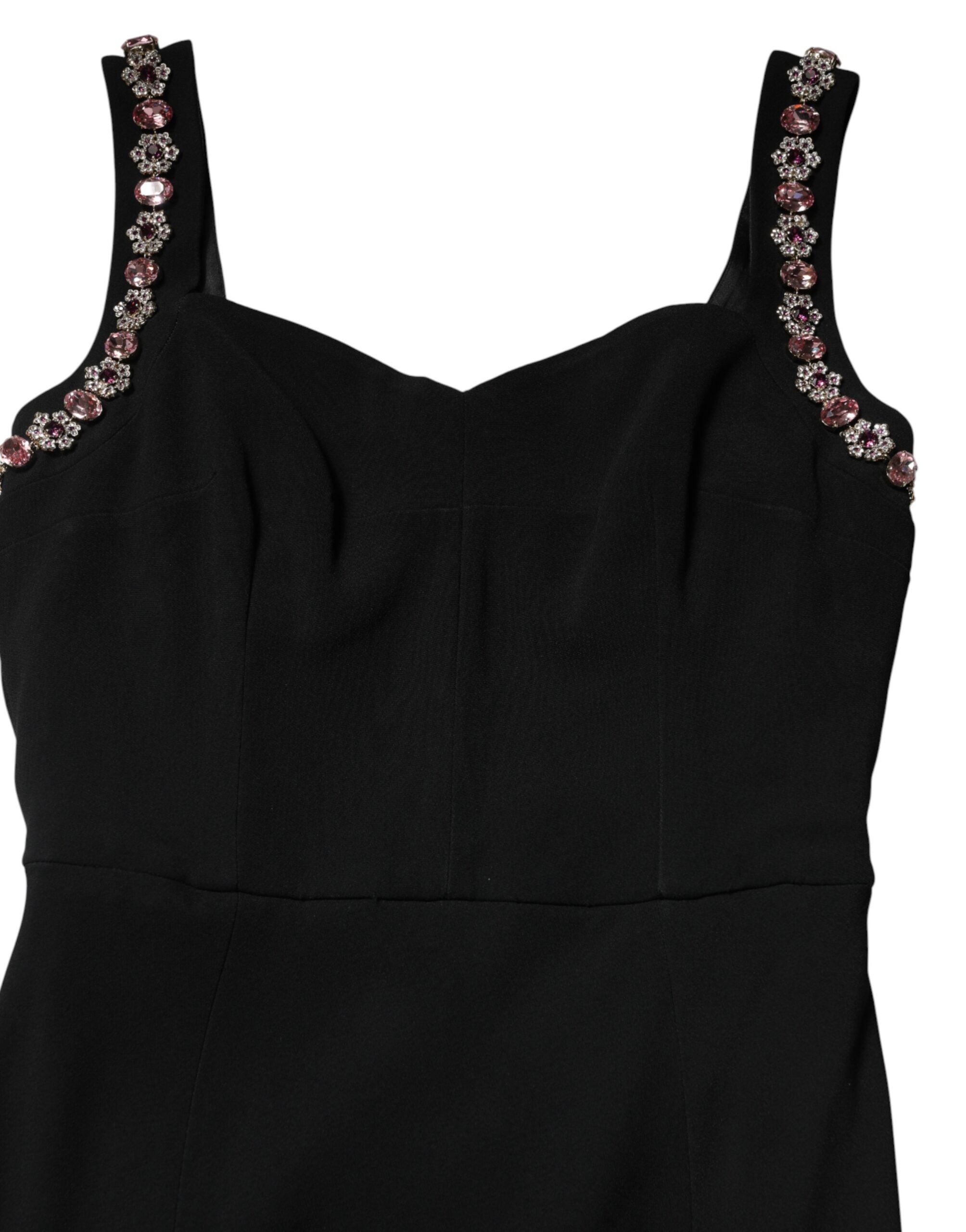 Robe longue noire Dolce & Gabbana moulante avec ornements brillants et détails élégants, parfaite pour une soirée sophistiquée.