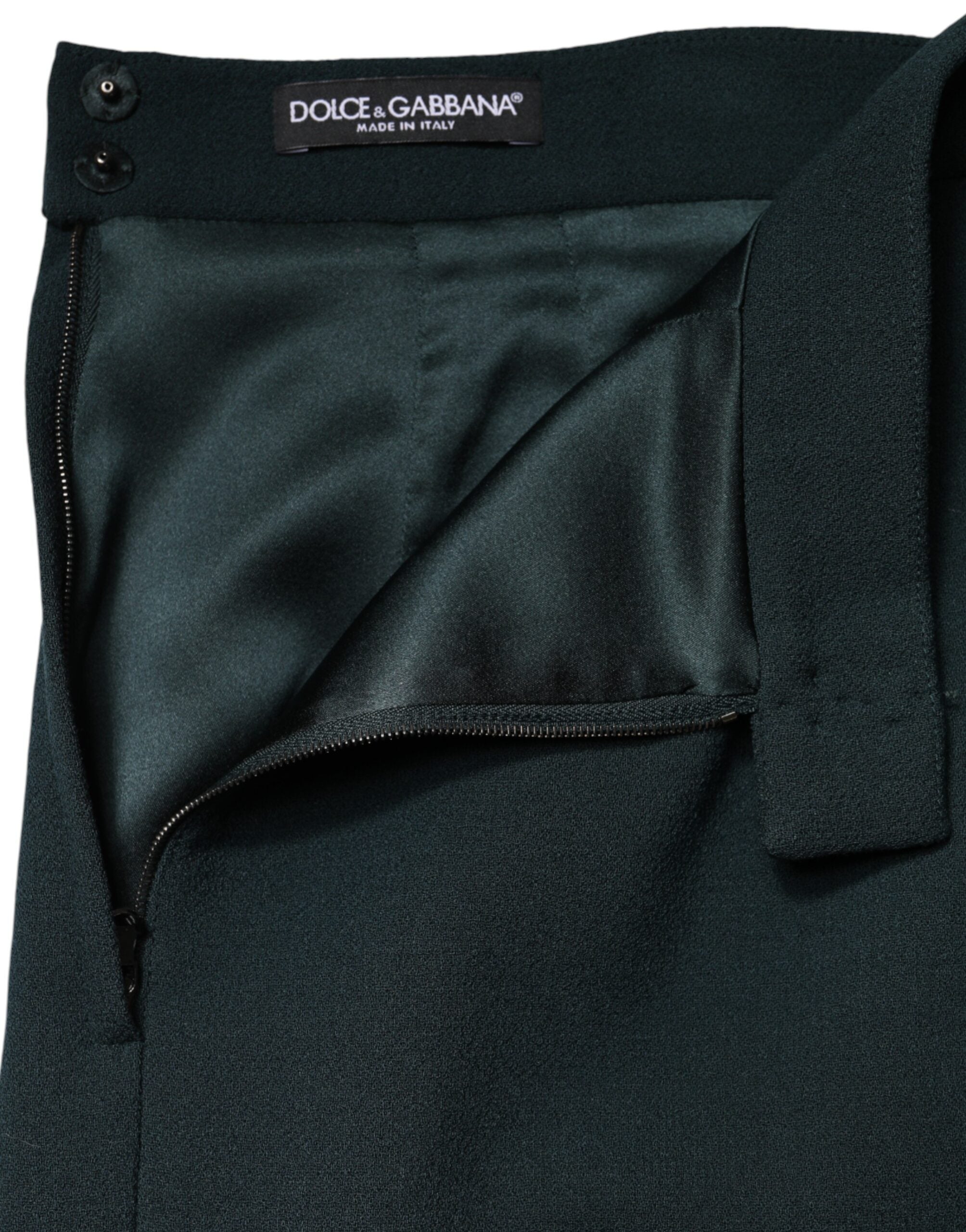 Jupe courte à coupe crayon en vert foncé de Dolce & Gabbana, taille moyenne, tissu élégant et ajusté.