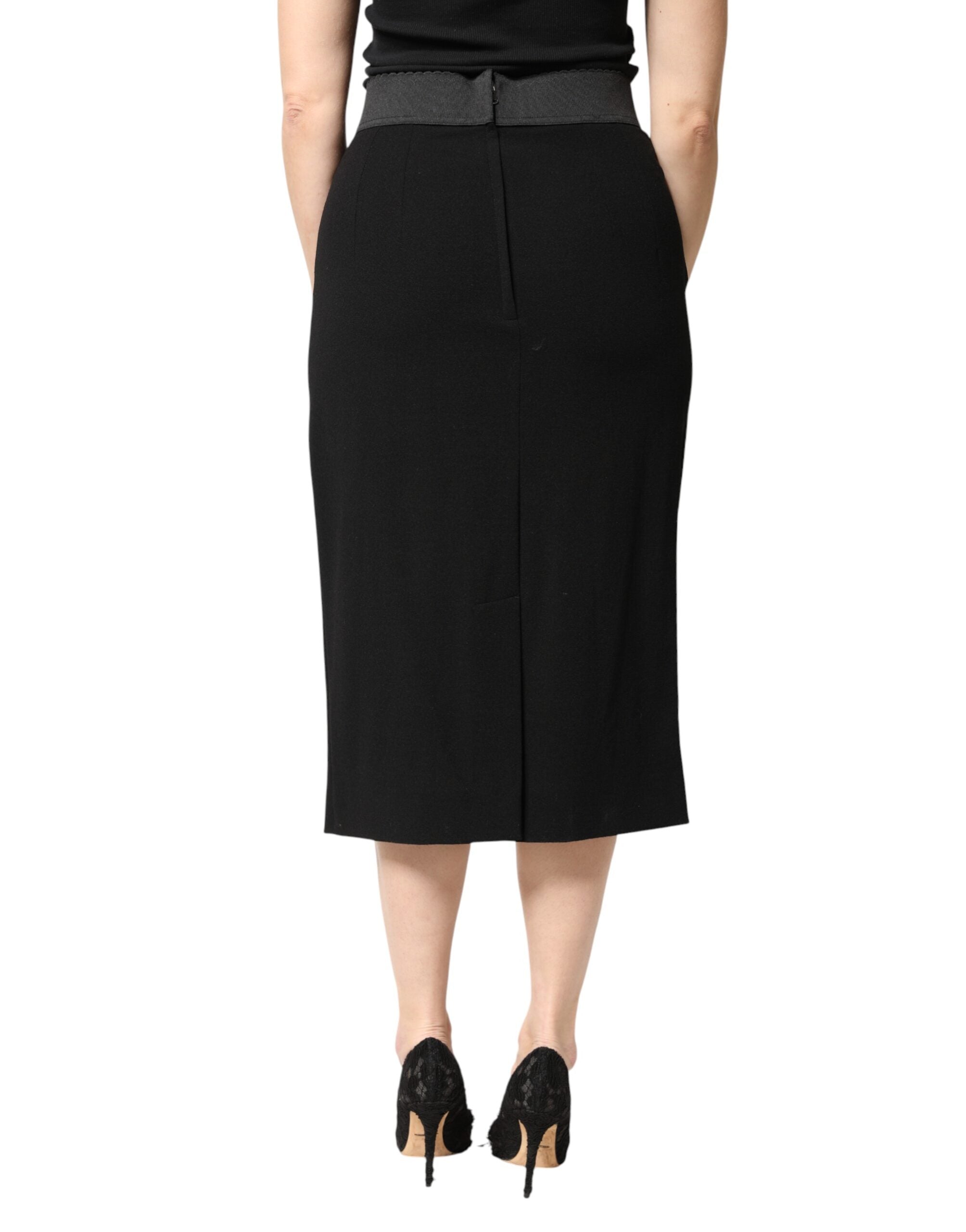 Jupe midi noire en laine à taille haute de coupe crayon de Dolce & Gabbana, élégante et sophistiquée.