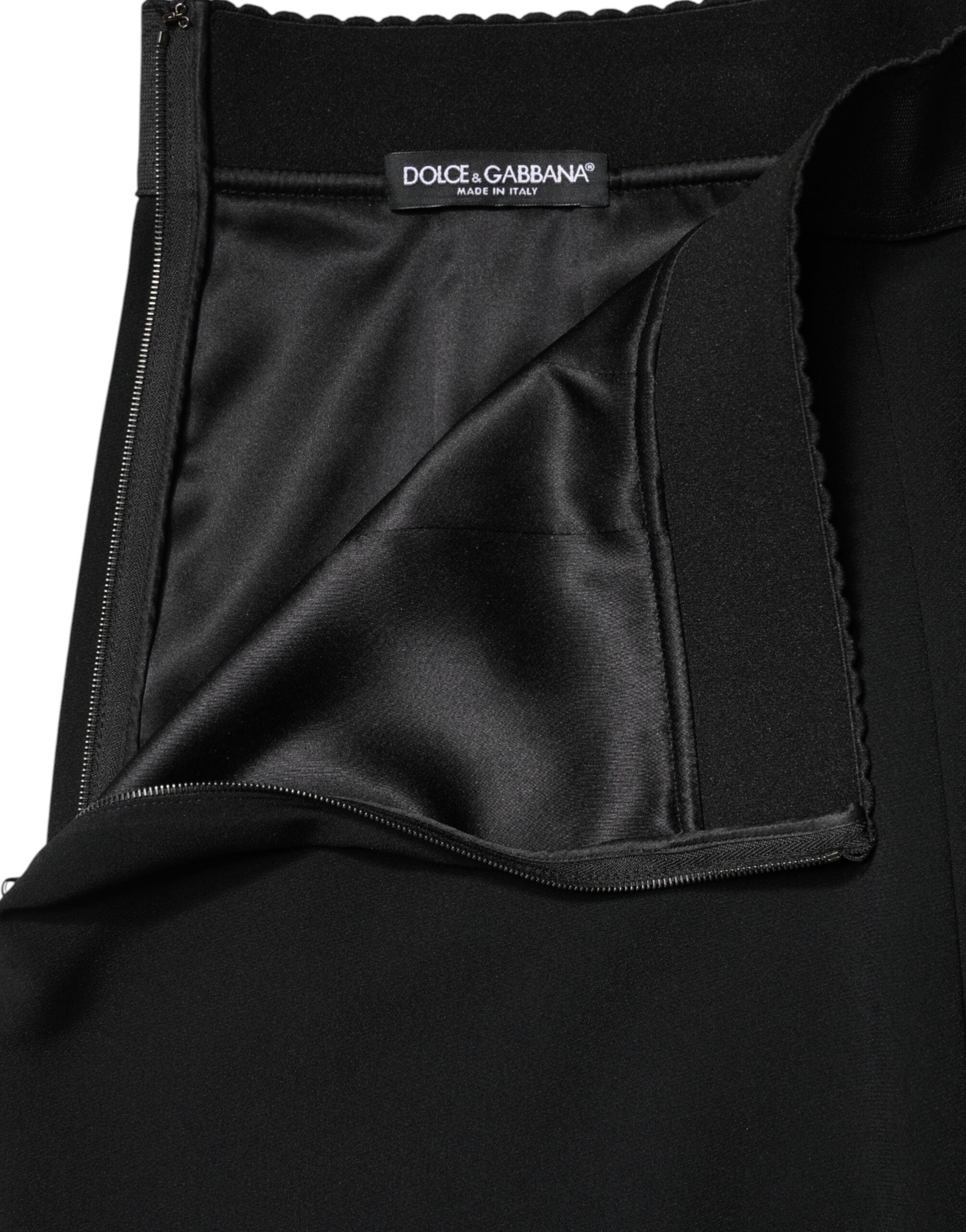 Jupe mi-longue noire Dolce & Gabbana à taille moyenne, coupe évasée en ligne A, longueur au genou, tissu élégant.